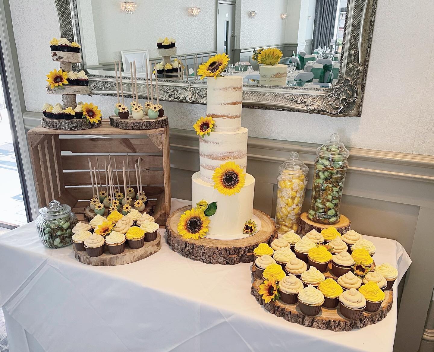 Sunnier days, sunshiney cake displays. From last summer for 🌻 Justin and Paul 🌻 #sunflower #seminakedcake #weddingcake #caketable #cakepops #cupcakes #sunflowerwedding #rusticweddingcake #weddingcakesglasgow #eatpretty #cakesofinstagram #instacake 