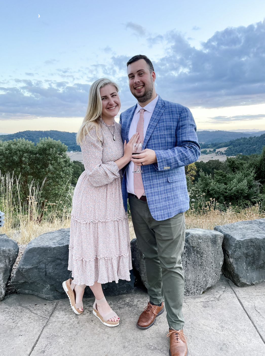Happy couple smiling at a wedding.