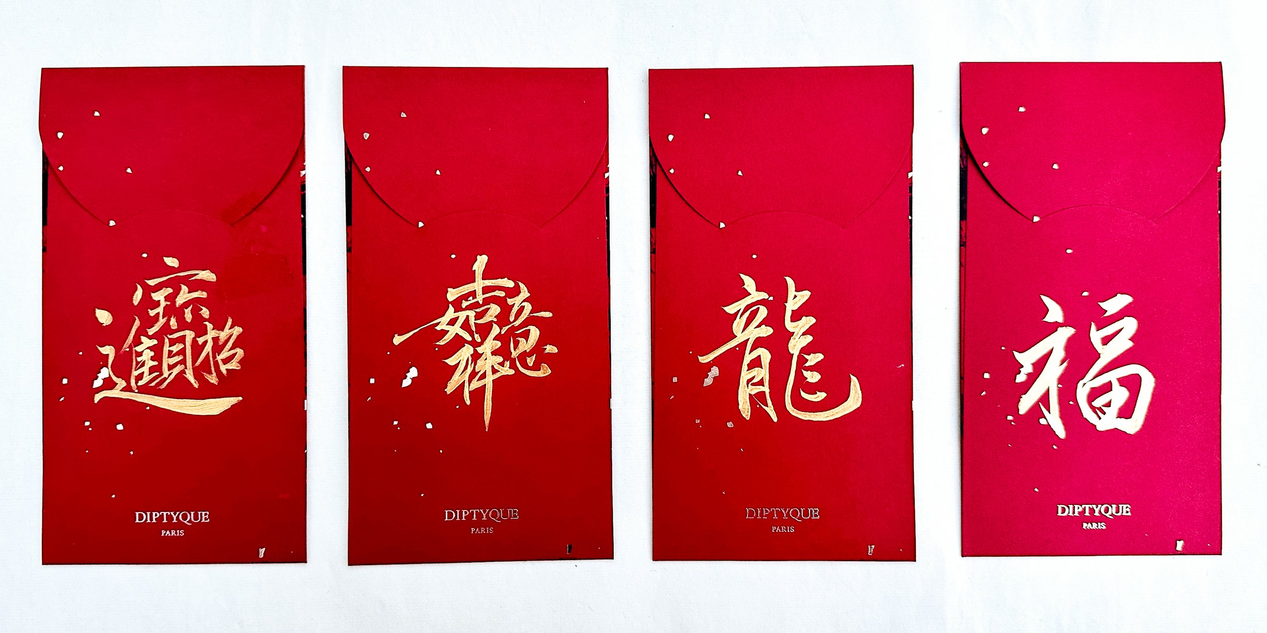 cathy-inkscripted-studios-san-francisco-bay-area-chinese-calligraphy-calligrapher-red-envelopes-good-luck-gold-ink.jpg