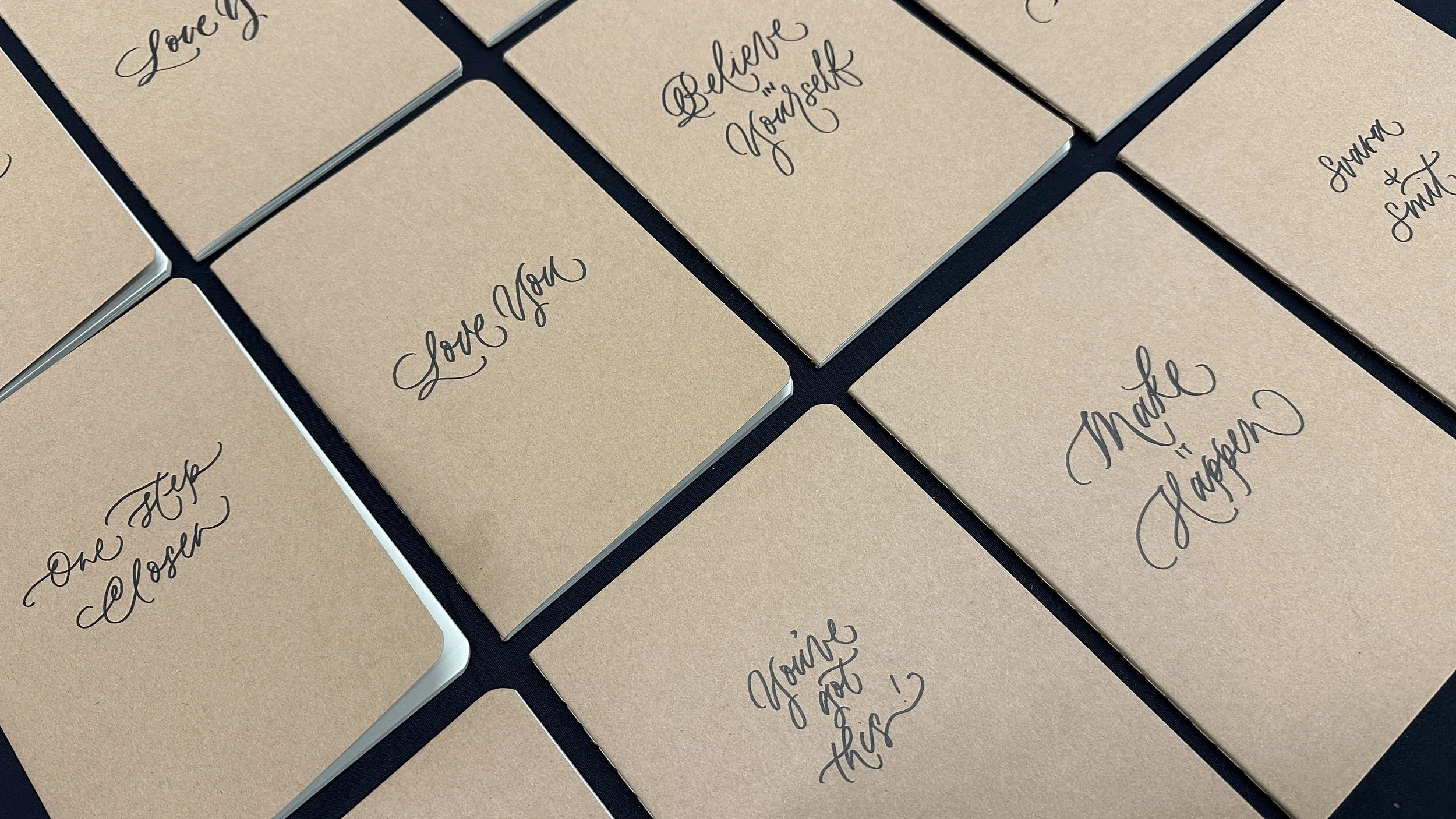 live-handwritten-calligraphy-notebook-customization-corporate-tech-company-event-activation-adobe-joyfest-san-jose.jpg