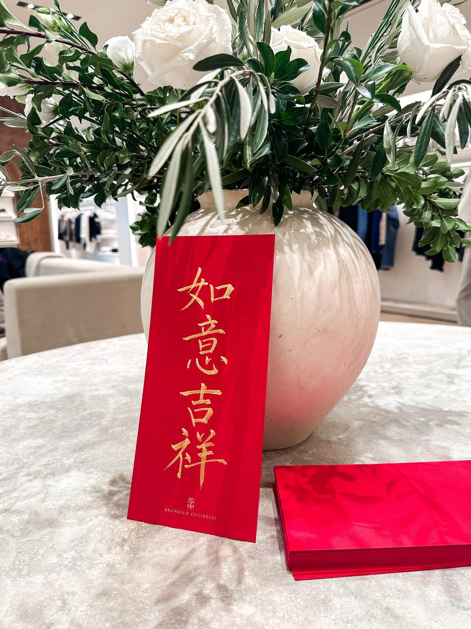 lunar-new-year-chinese-scroll-couplet-brush-calligraphy-red-paper-envelope-brunello-cucinelli-san-francisco-bay-area-california-west-coast.jpg