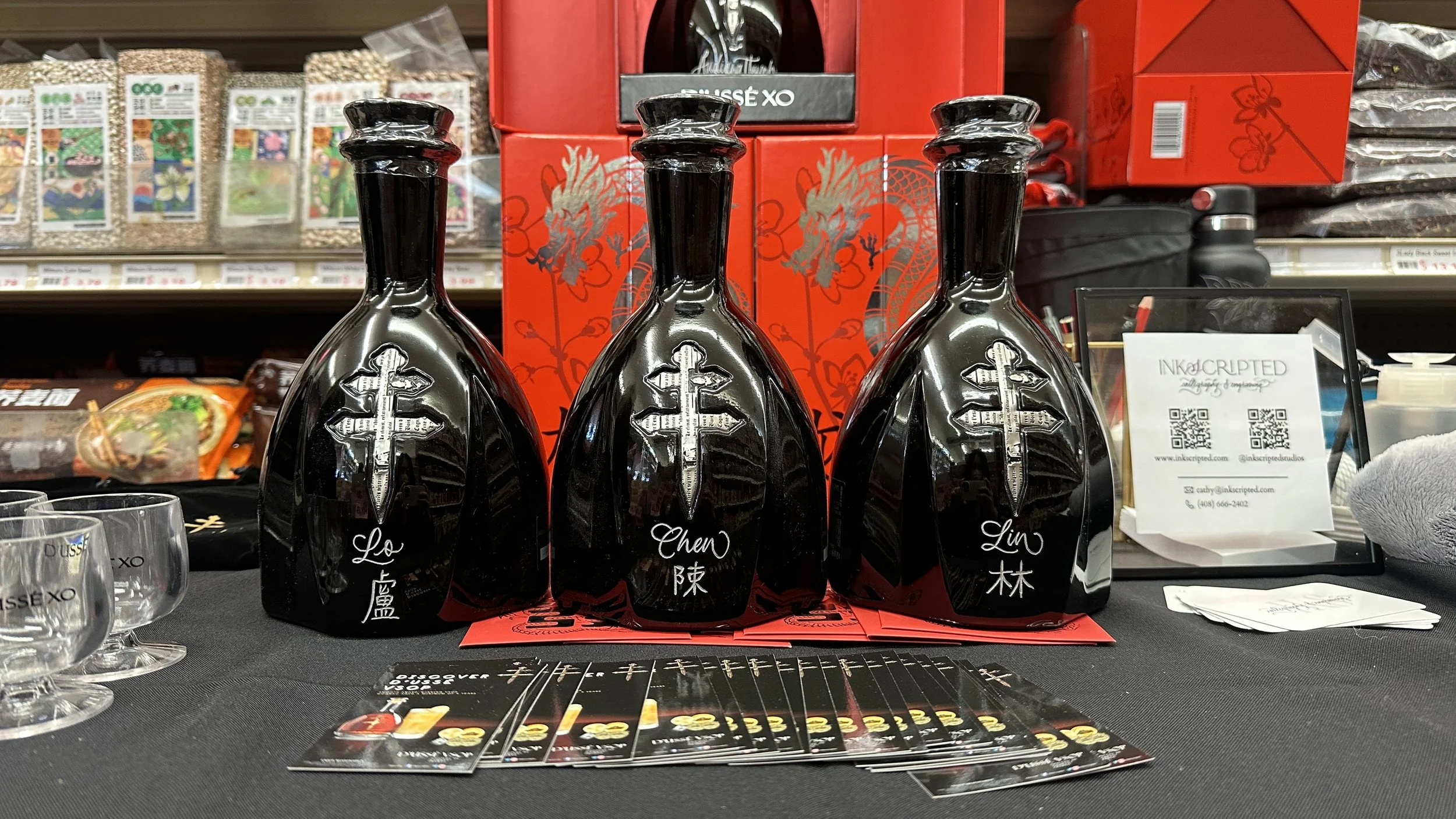 chinese-characters-calligraphy-engraving-hand-etched-wine-liquor-bottle-VIP-gifting-last-names-red-gold-english--dusse-san-francisco-chinatown-bay-area.jpg