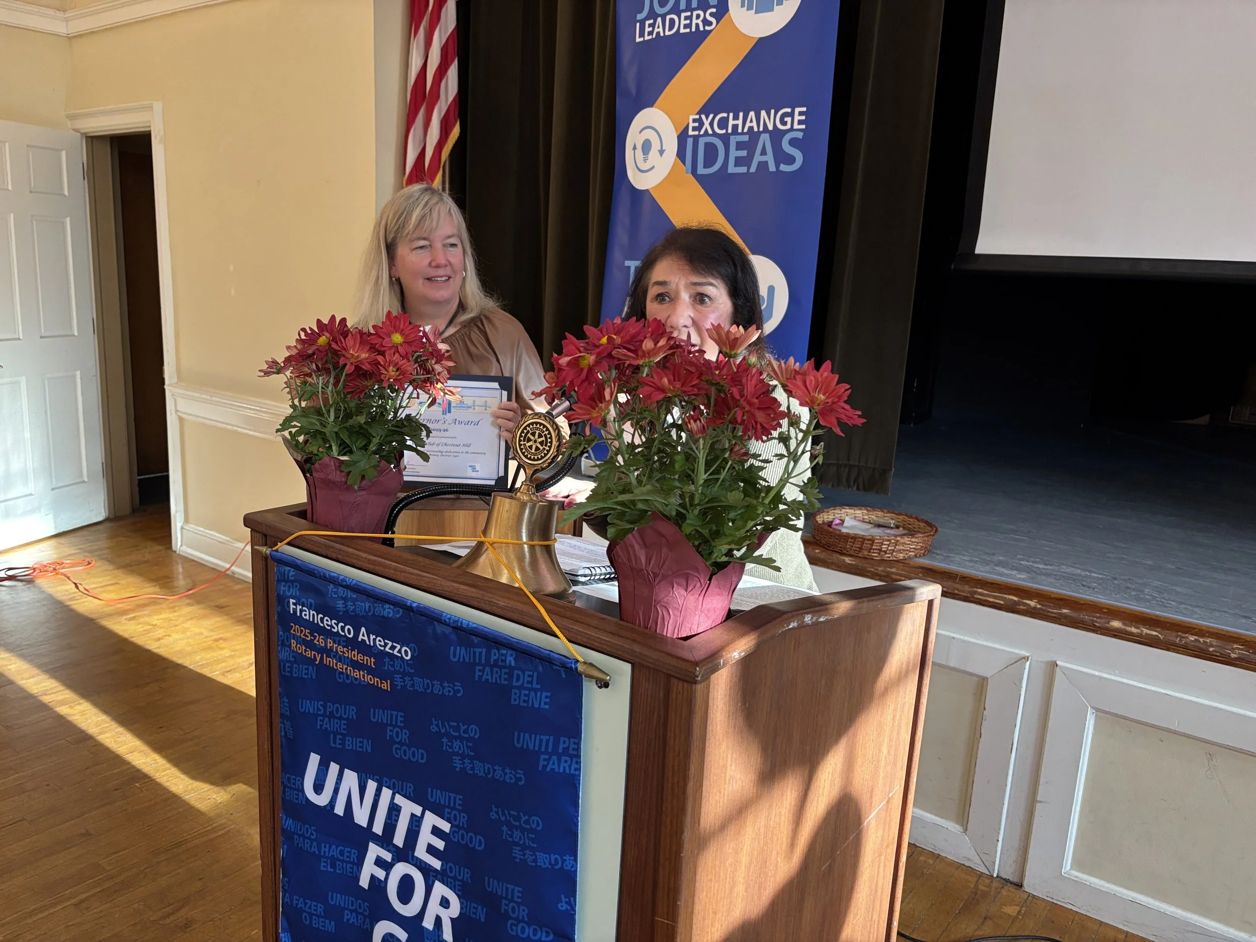 District Governor presents club award to President, Cathy Brzozowski  