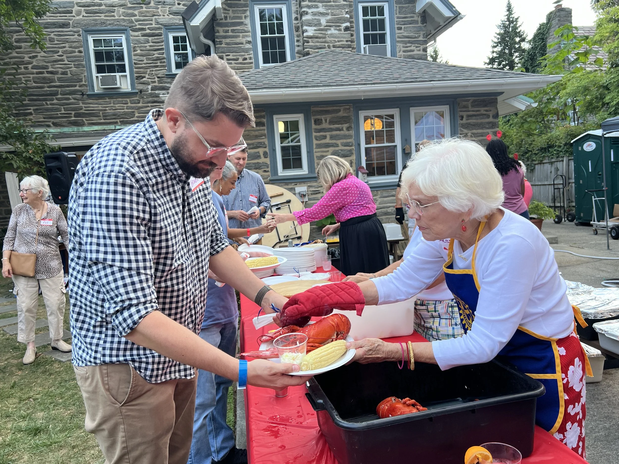 Serving 250 guests at her home