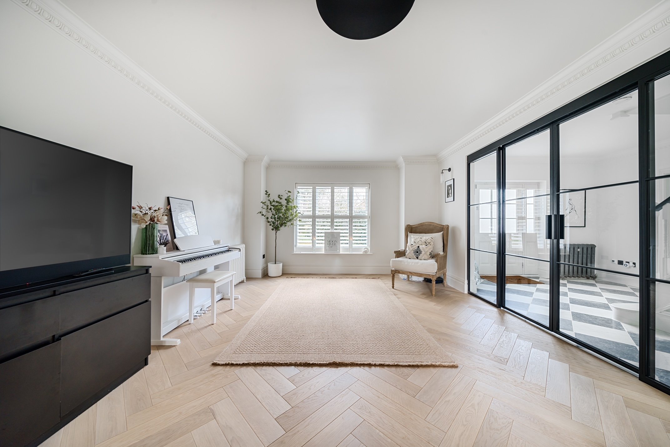 Bespoke steel internal doors within a styled luxury home interior by Joshua James.