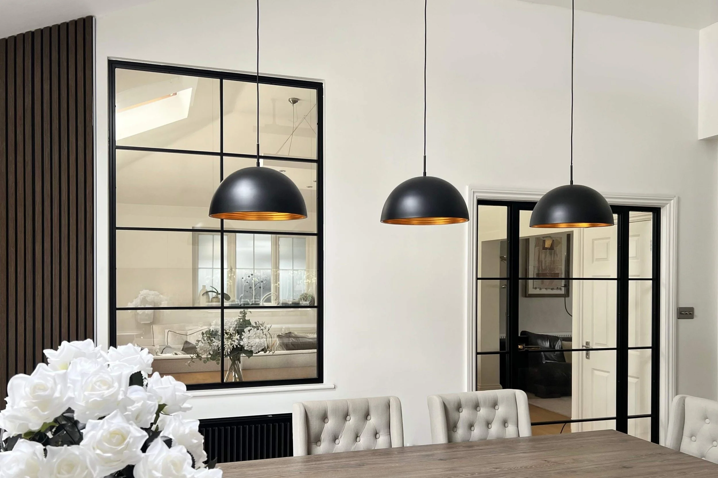 Steel internal doors defining space while allowing light to flow