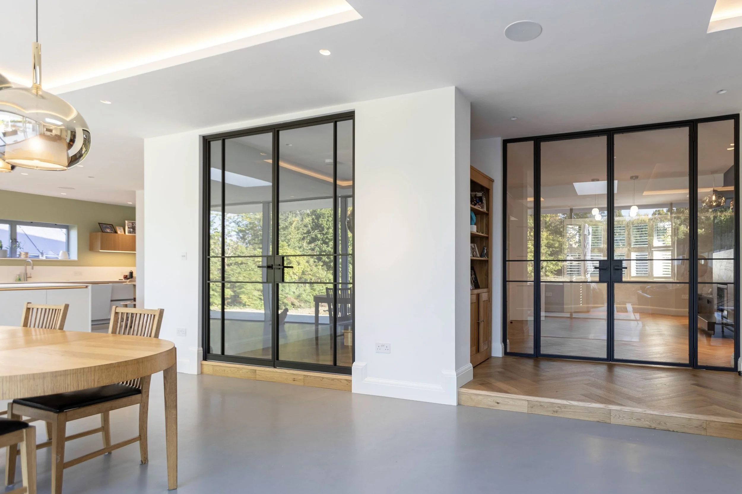 Slim fire rated steel doors set in modern high end home