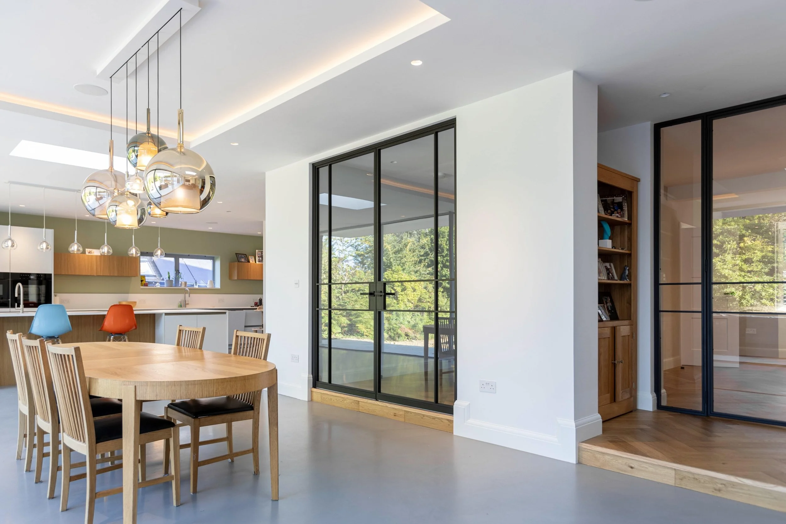 E30 fire-rated steel internal doors designed to retain slim sightlines in a residential renovation