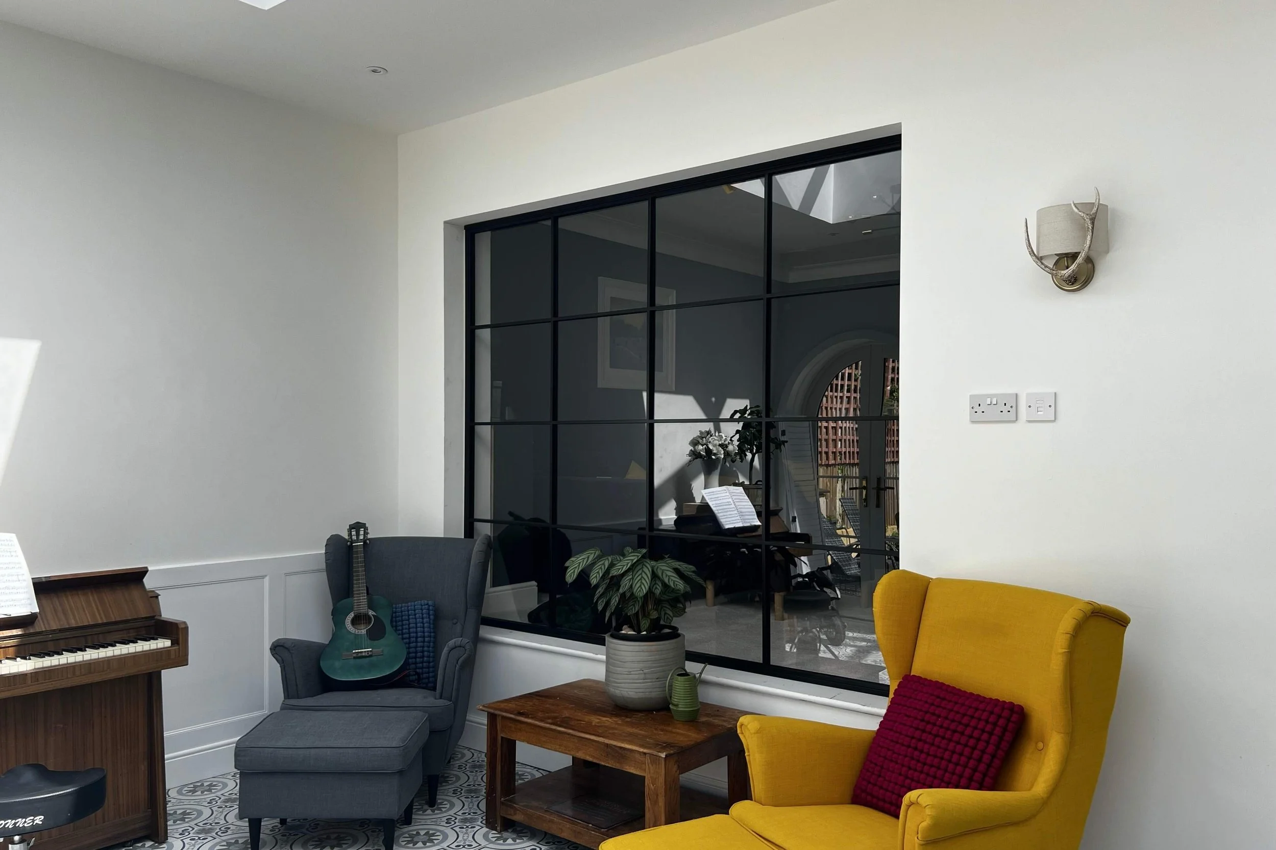 Steel screen glass providing separation while maintaining light