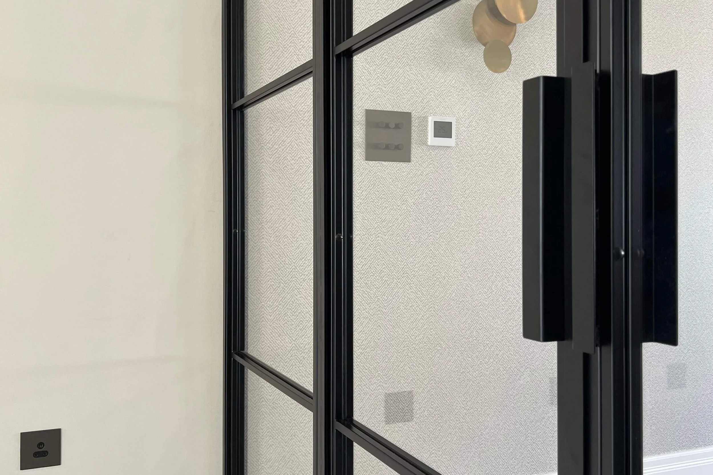 Close-up detail of powder coat finish on a Joshua James bespoke steel internal door frame.