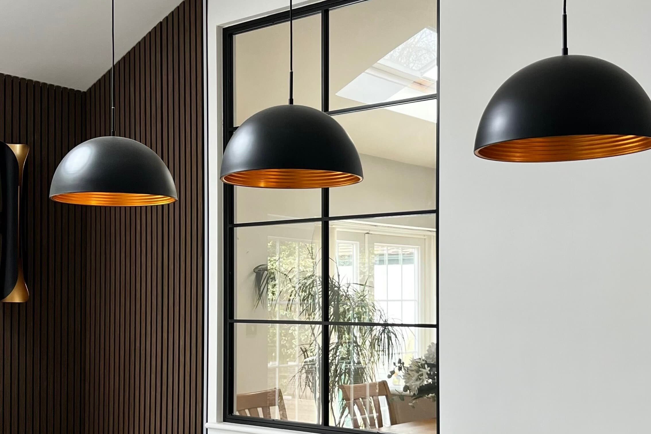 Bespoke steel internal room divider in a luxury open plan living space by Joshua James.