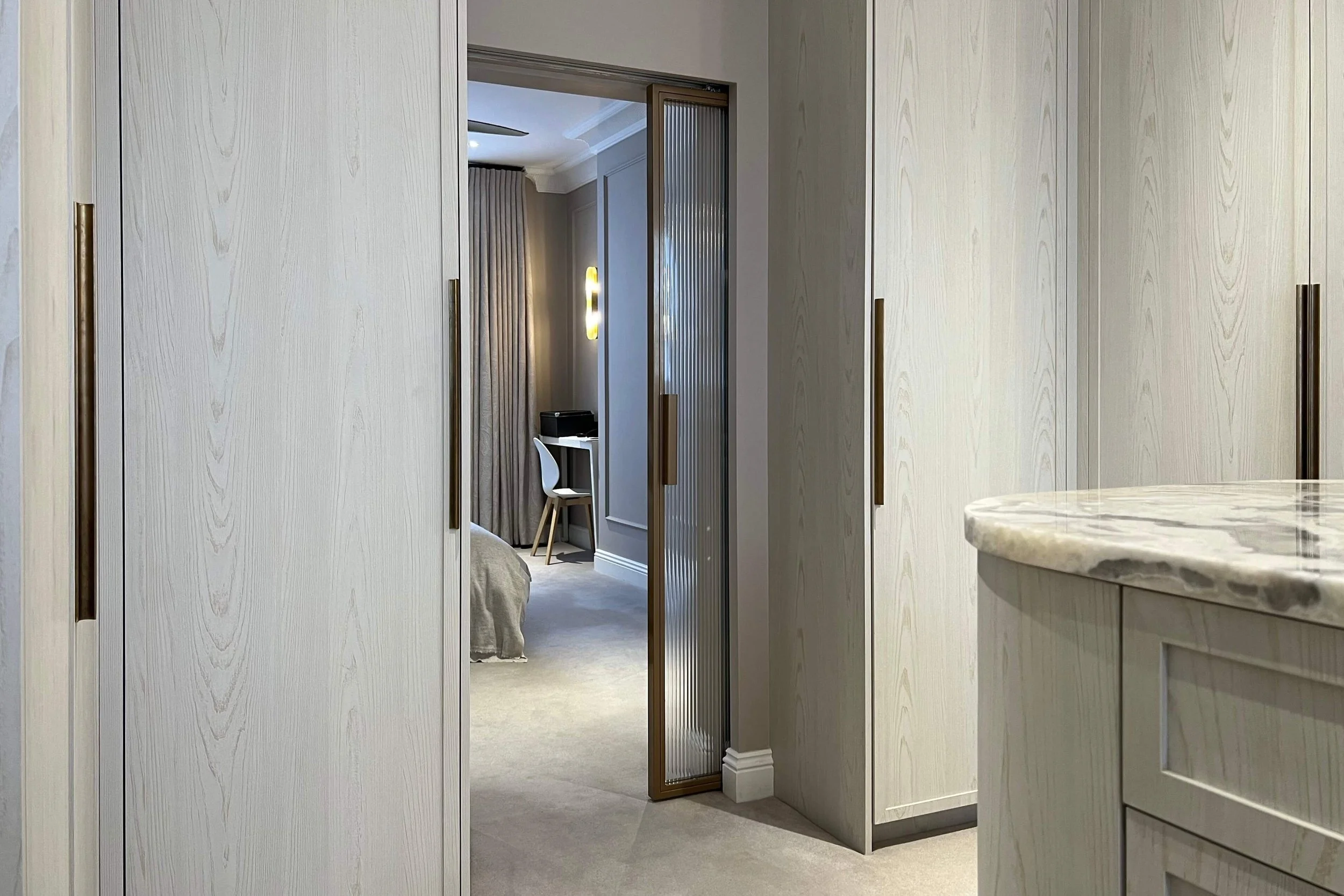 Steel internal door with reeded glass in a UK interior