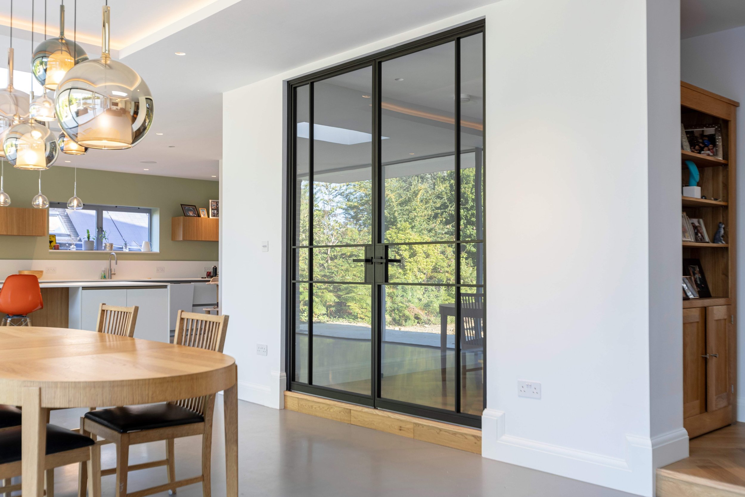 Bespoke steel doors and partitions designed for a luxury residential interior