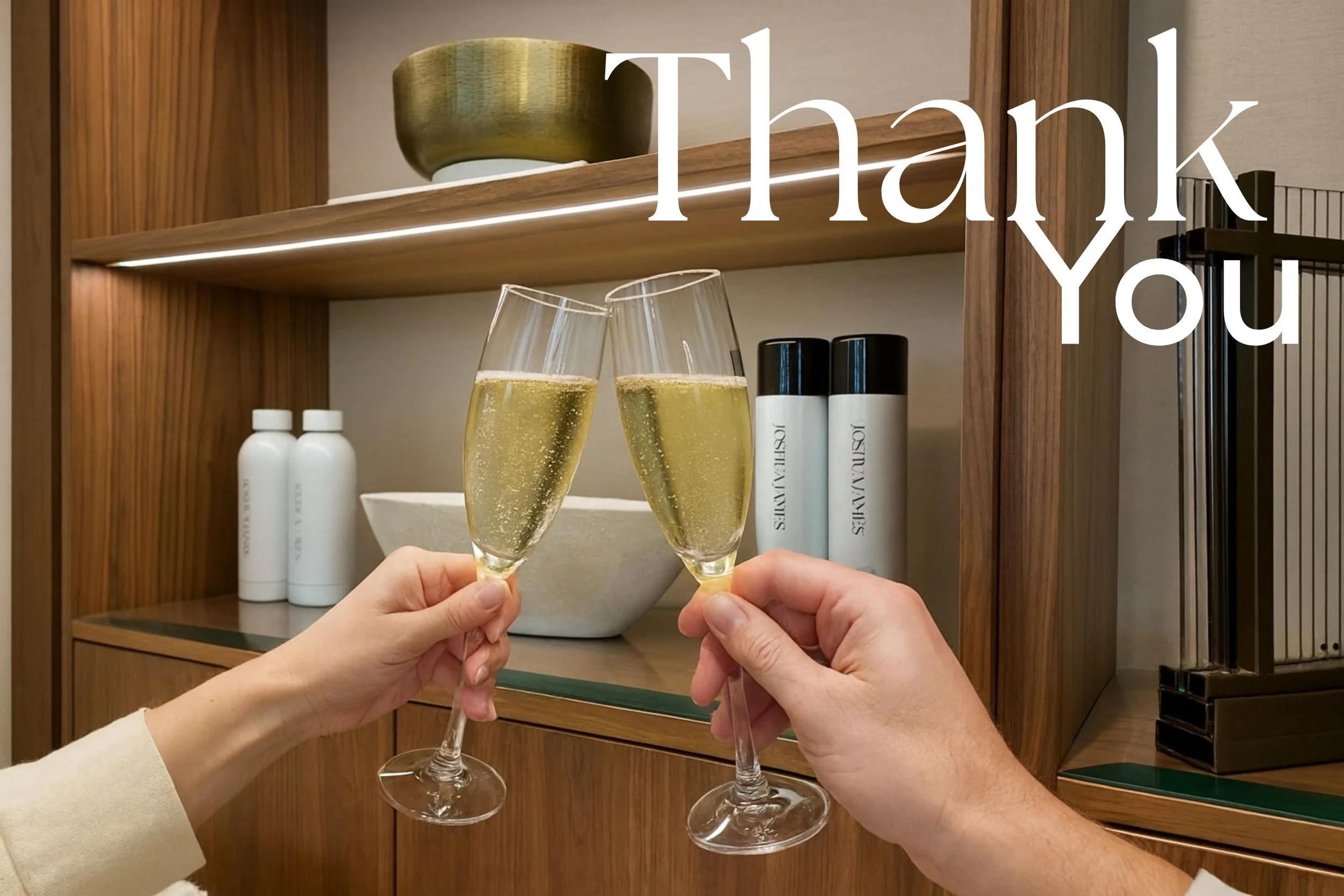 Champagne glass cheers in the Joshua James Studio