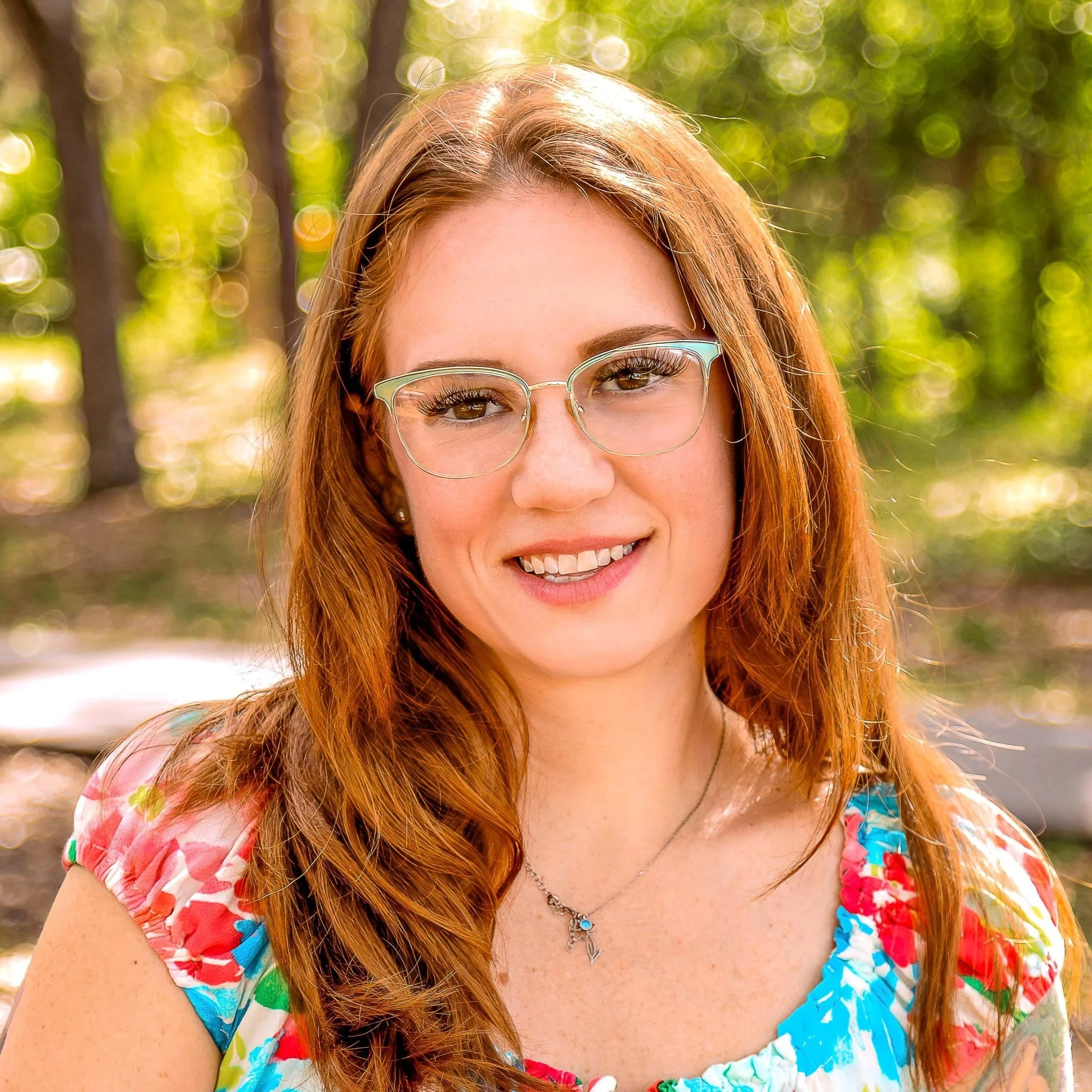 Headshot of Rebecca Henshaw, LCSW, a therapist at Dandelion Therapy Group in Port Charlotte, FL.