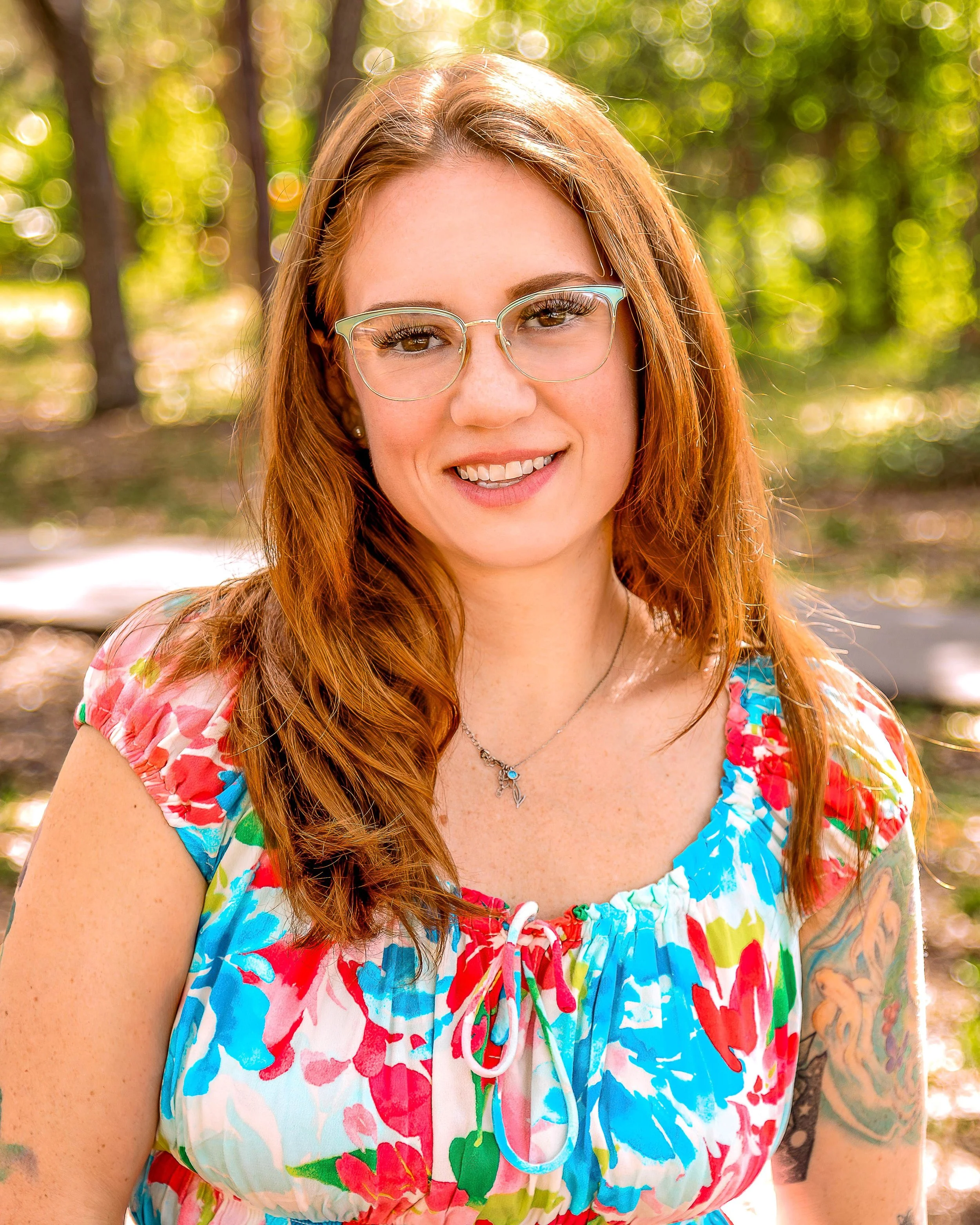 Headshot of Rebecca Henshaw, LCSW, a therapist at Dandelion Therapy Group in Port Charlotte, FL.