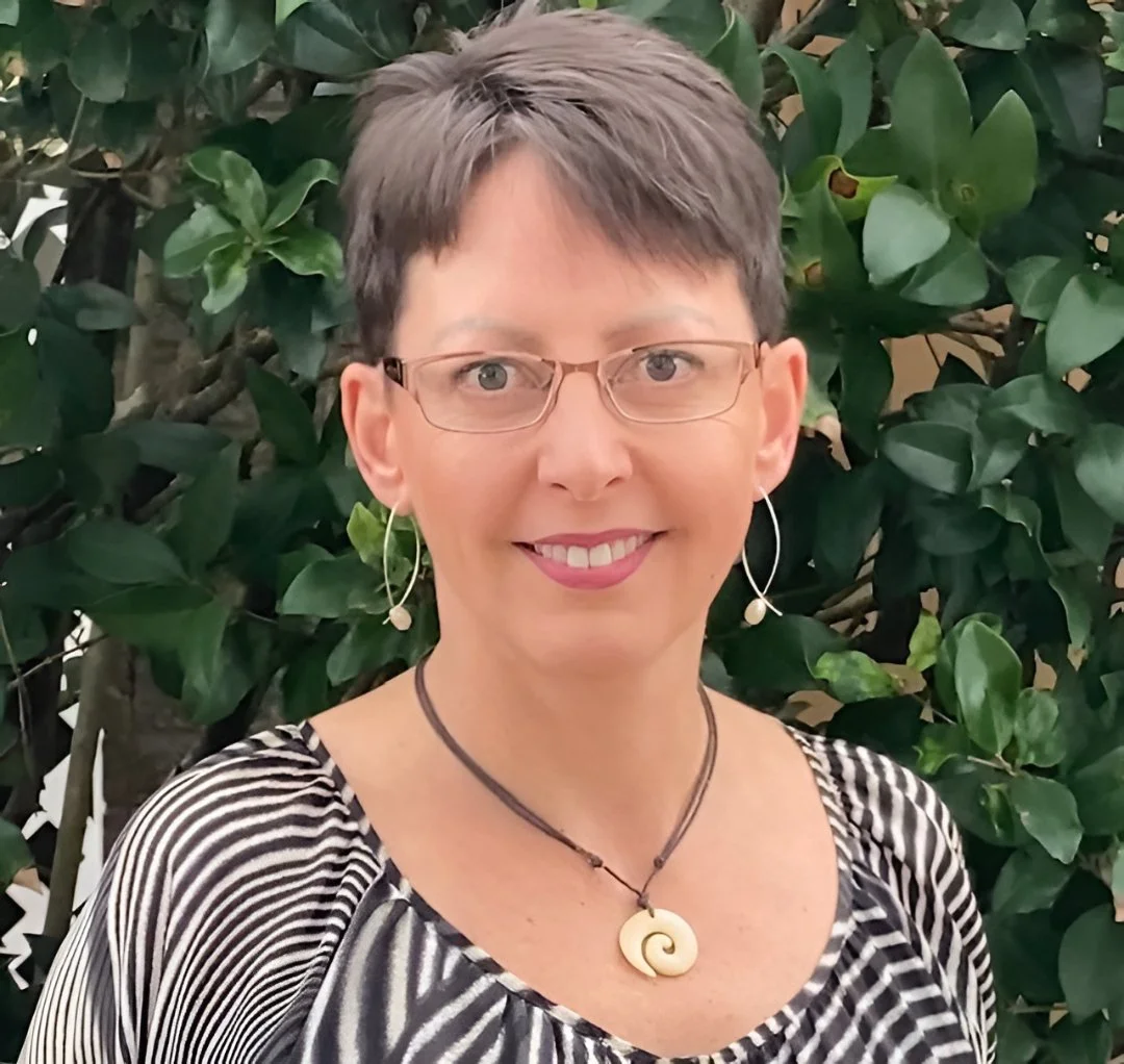 Professional headshot of Patricia Card, a mental health counselor at Dandelion, smiling in front of a neutral background.