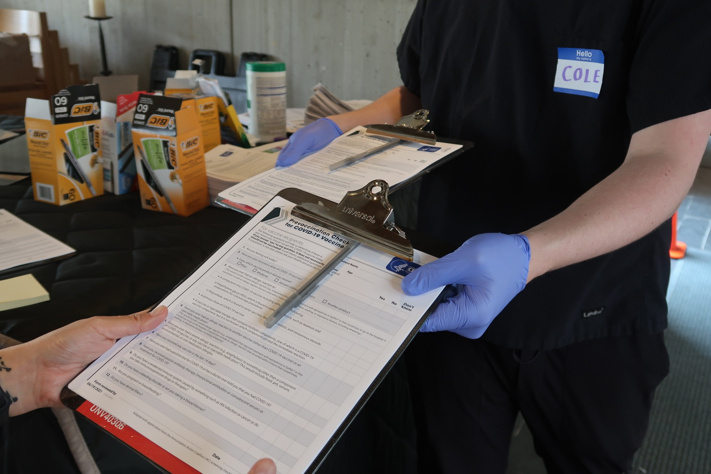 VHEI staffers and volunteers would walk attendees through the registration process.
