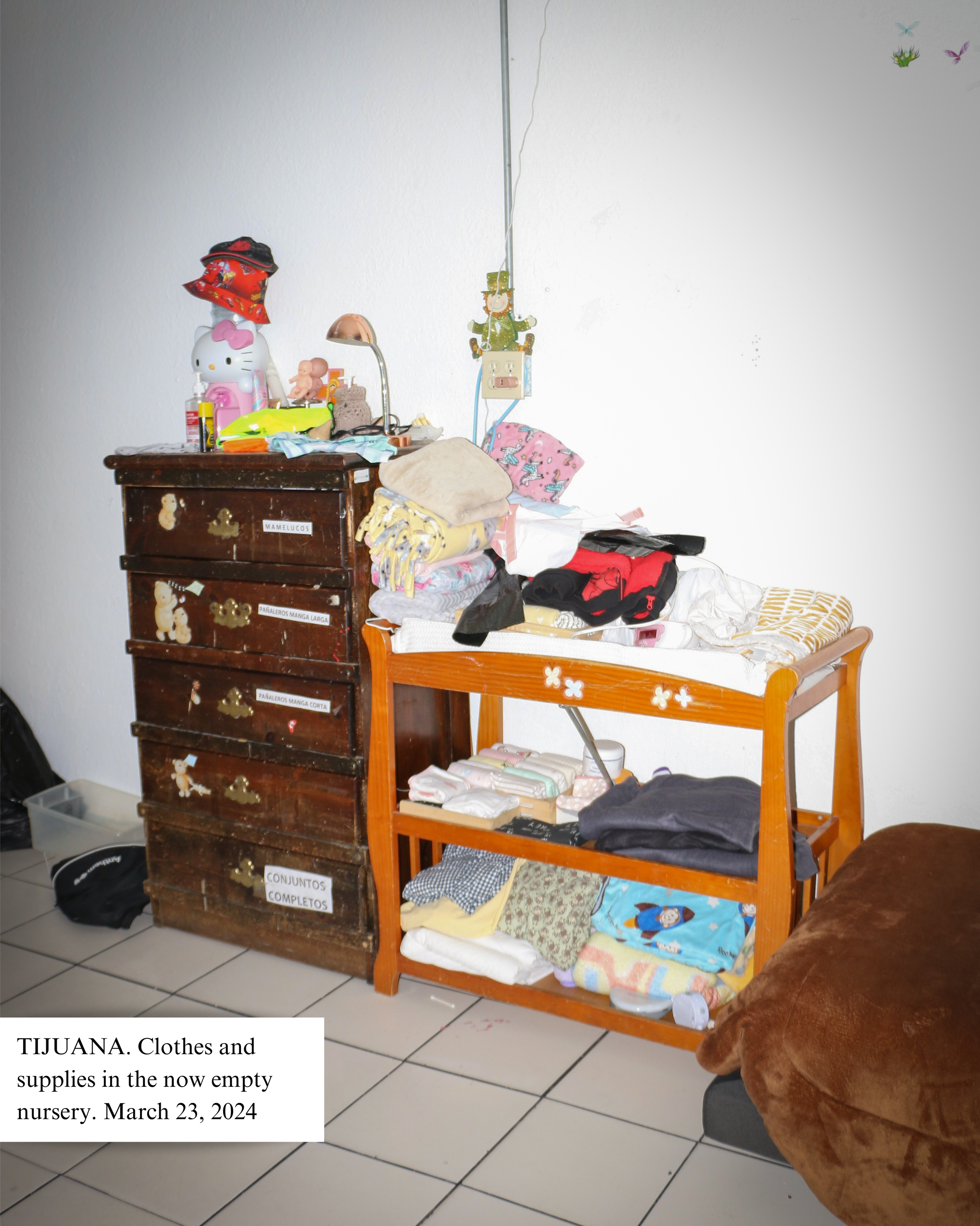 TIJUANA, MX Clothes and supplies in the now empty nursery. 32324.png