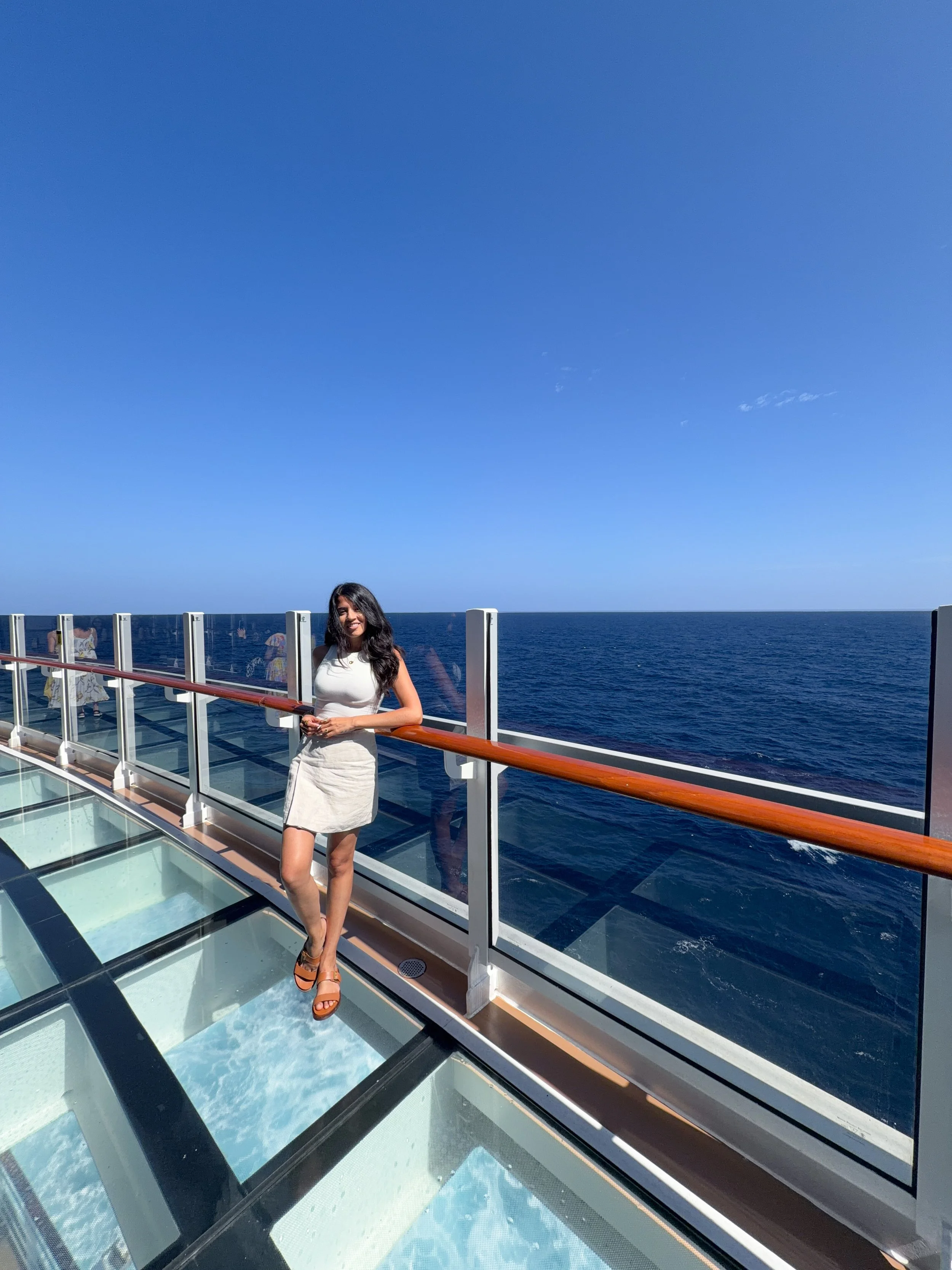 Ashley standing on a cruise ship