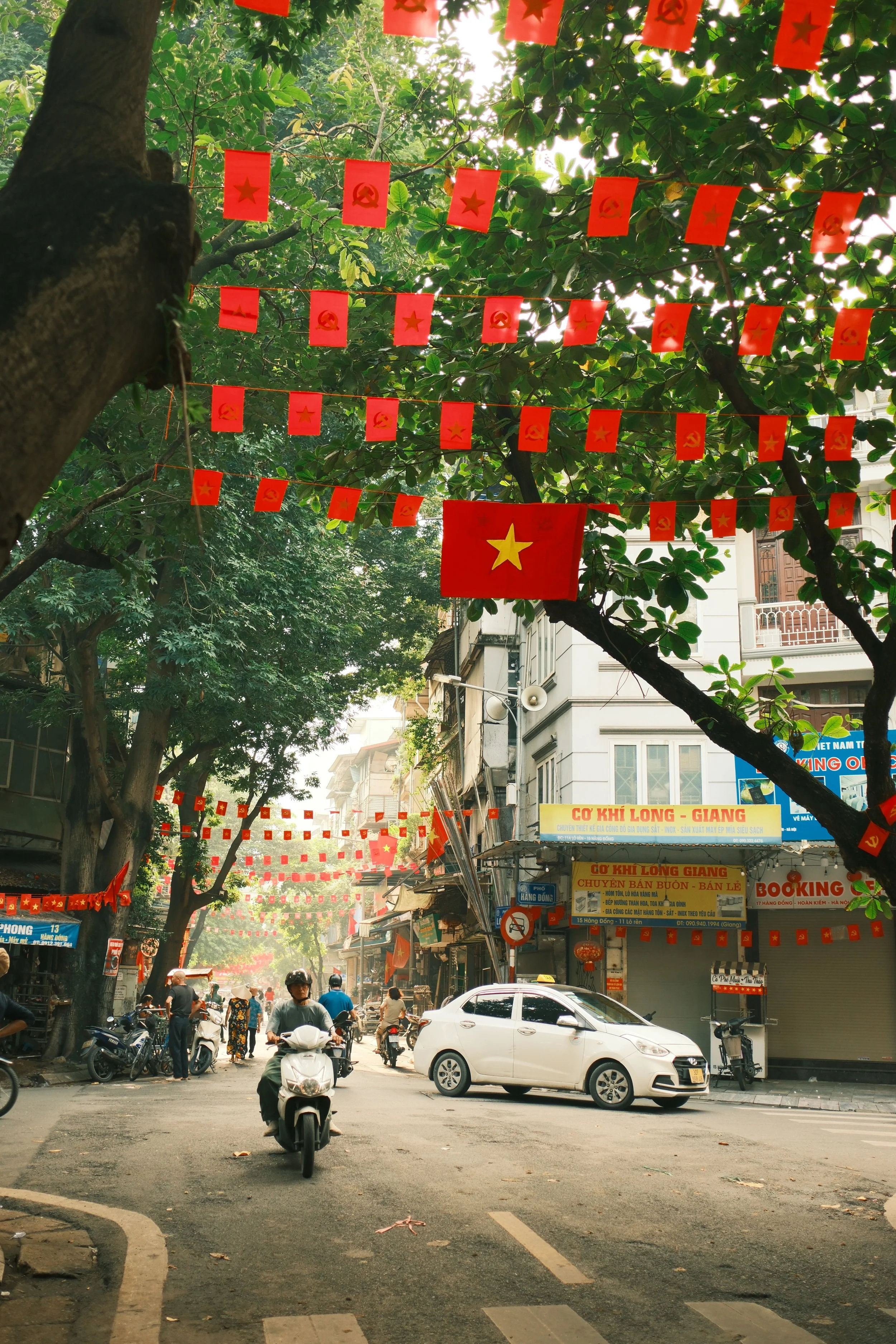 Motorbike driving through Hanoi streets
