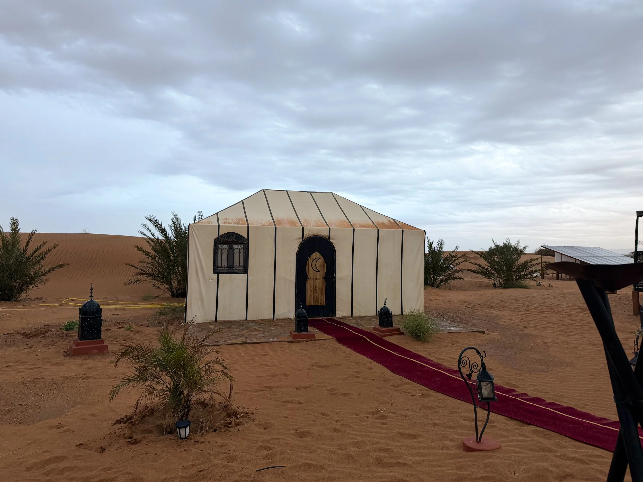 Private tents at Tiziri camp in the Sahara Desert