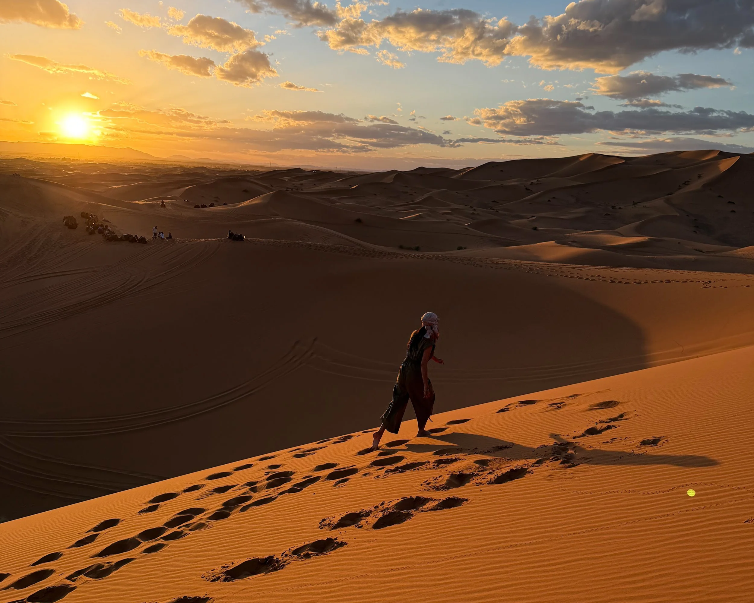 Ashley walking on the dunes in the Sahara Desert
