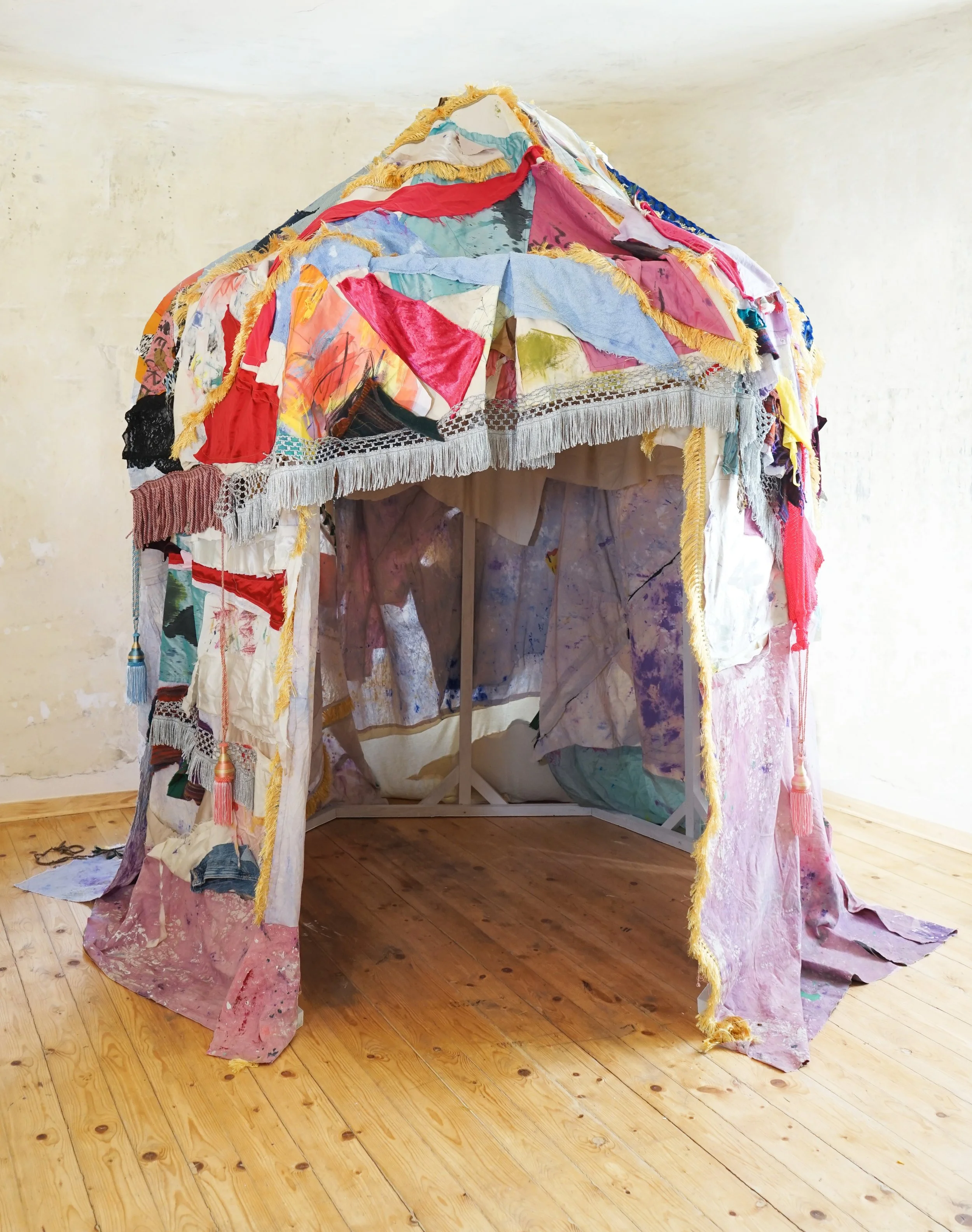 Home, 2025, 
Diverse textiles, ~ 263 × 257 x 510 cm