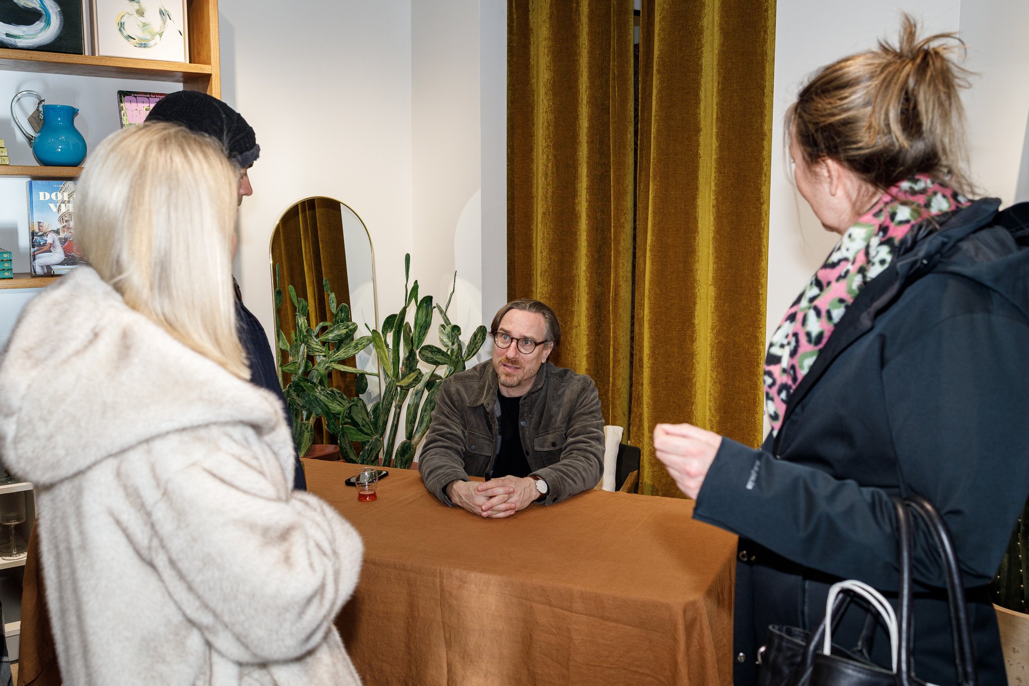 MDF co-founder Derek Brown talking with guests.
