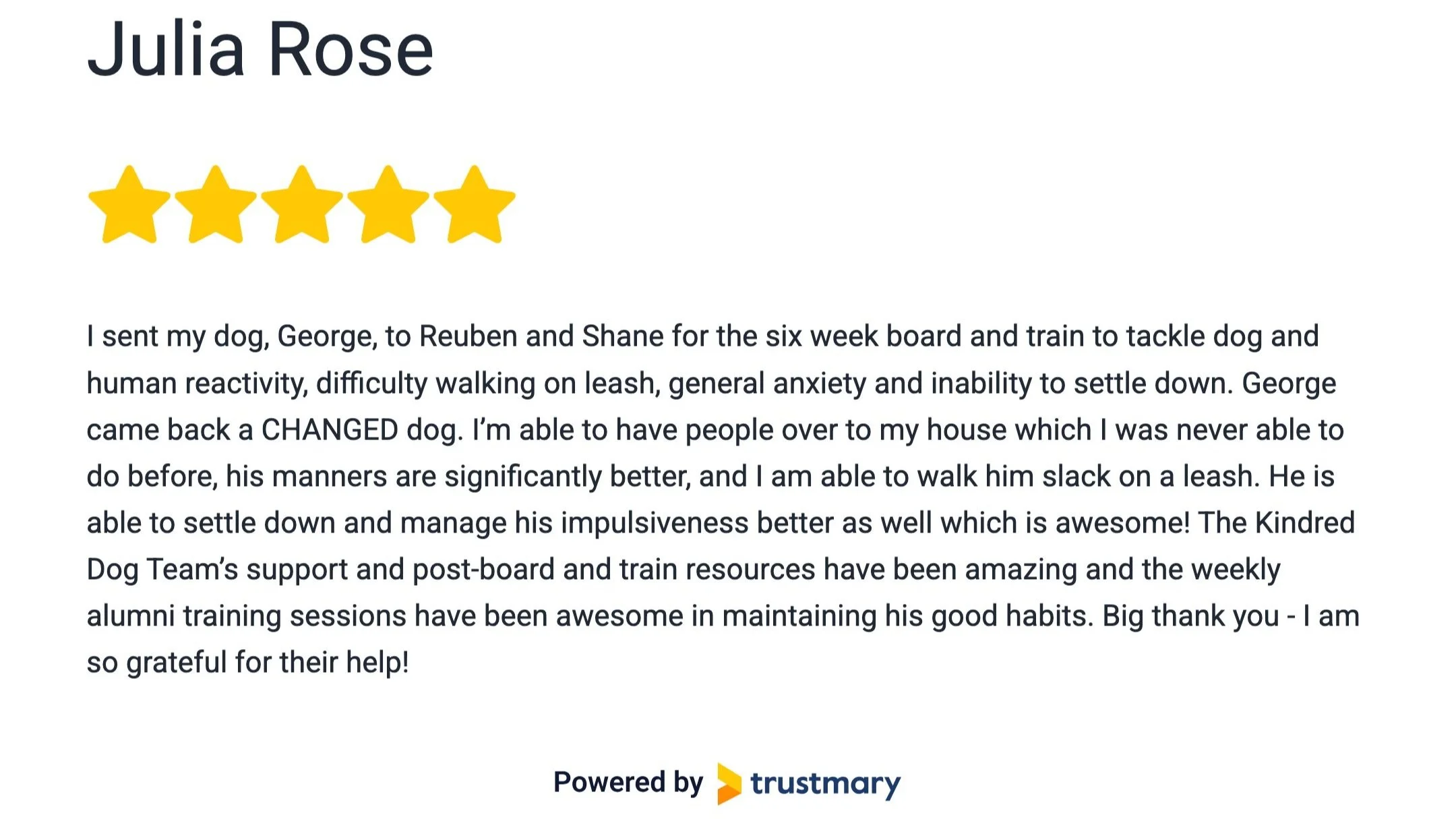 Customer review for Julia Rose with a five-star rating and a detailed testimonial about dog training success, featuring Trustmary branding at the bottom.