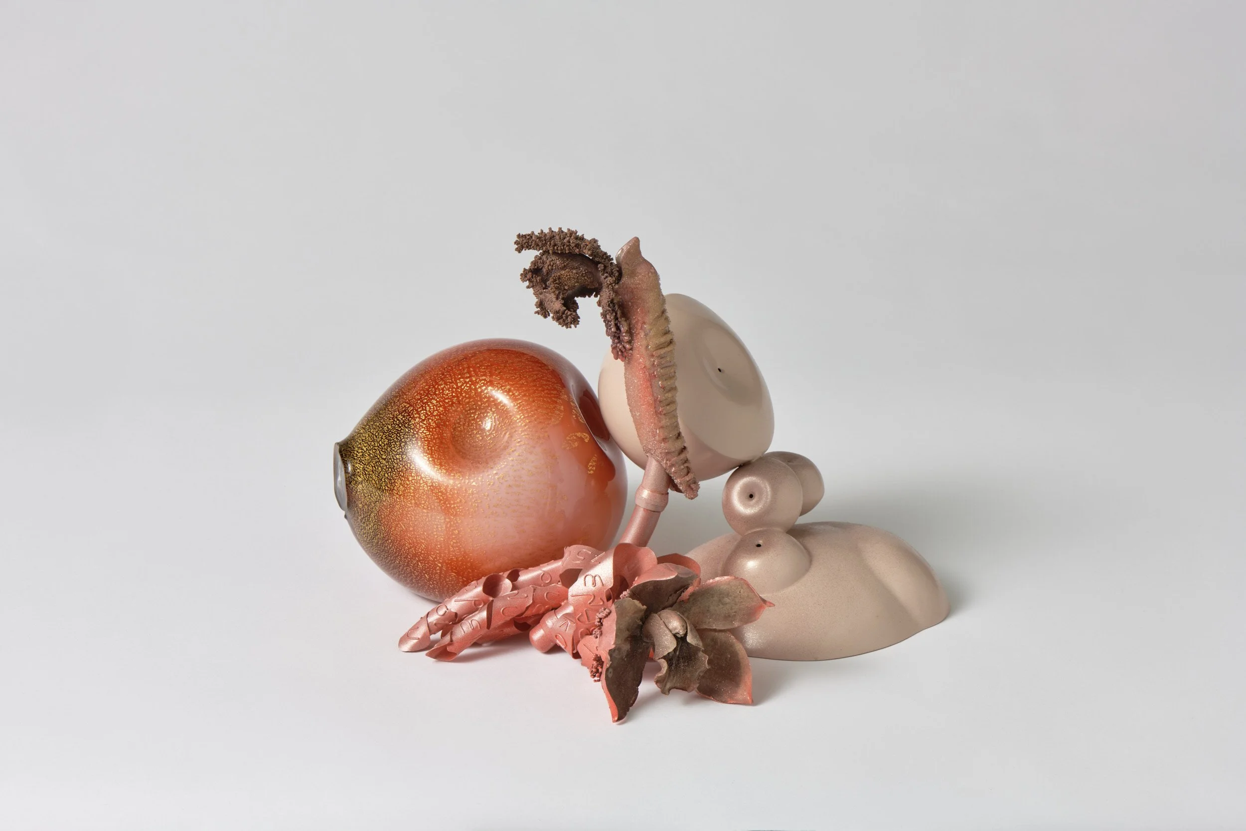  The Death Rattle , 2025
 blown glass, gold, sterling silver, copper, shibuichi, bronze, glass beads, powder coat, paint, filament/thermoplastic, epoxy, pistacia lentiscus resin
 300 x 255 x 207 mm
  $5,550