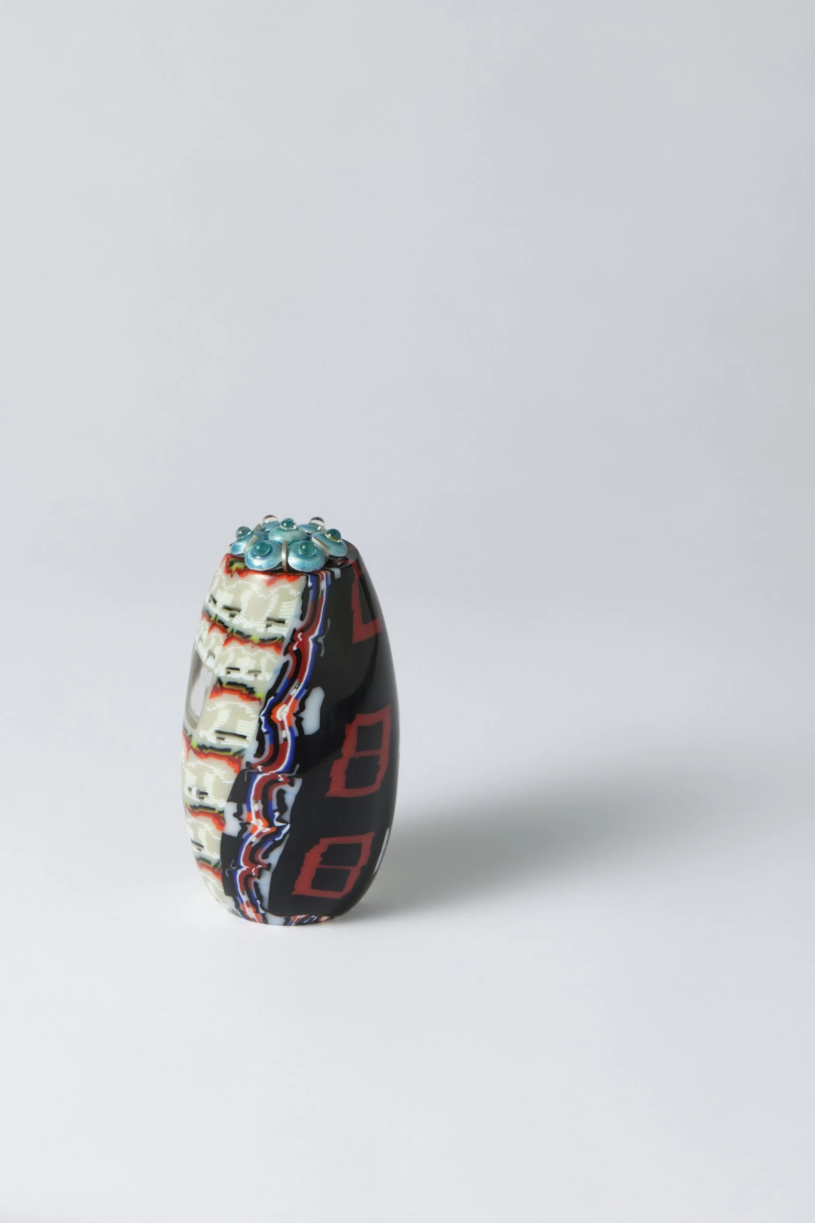 Θ |Theta no.2 , 2025-2026
 bullseye glass, fine silver, sterling silver, vitreous enamel, glass beads
 155 x 70 x 70 mm
  $3,500