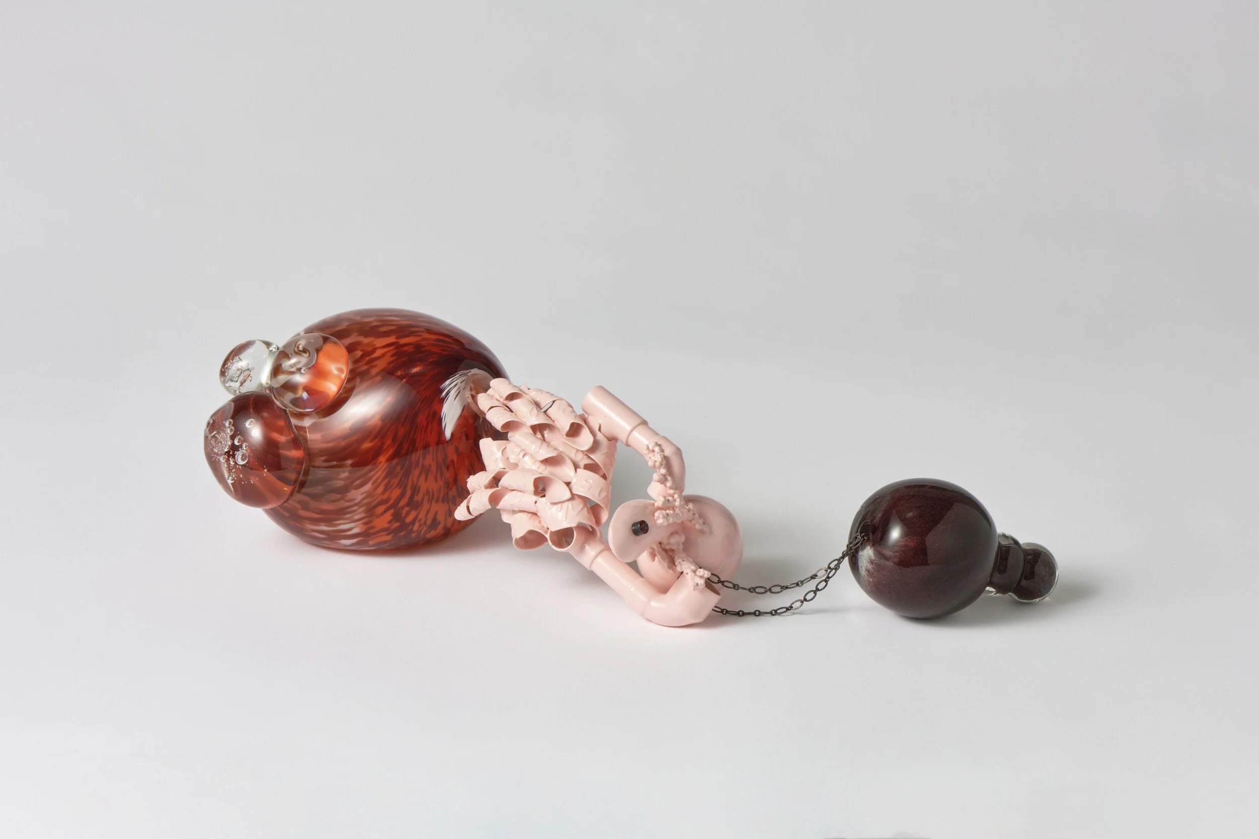  Hēma/Merimna (μέριμνα) , 2025-2026
 (pendant with objects)
 blown glass, copper, oxidised sterling silver, ruby, powder coat
 370 x 220 x 90 mm (combined)
 610 x 190 x 90 mm (pendant)
  $3,100