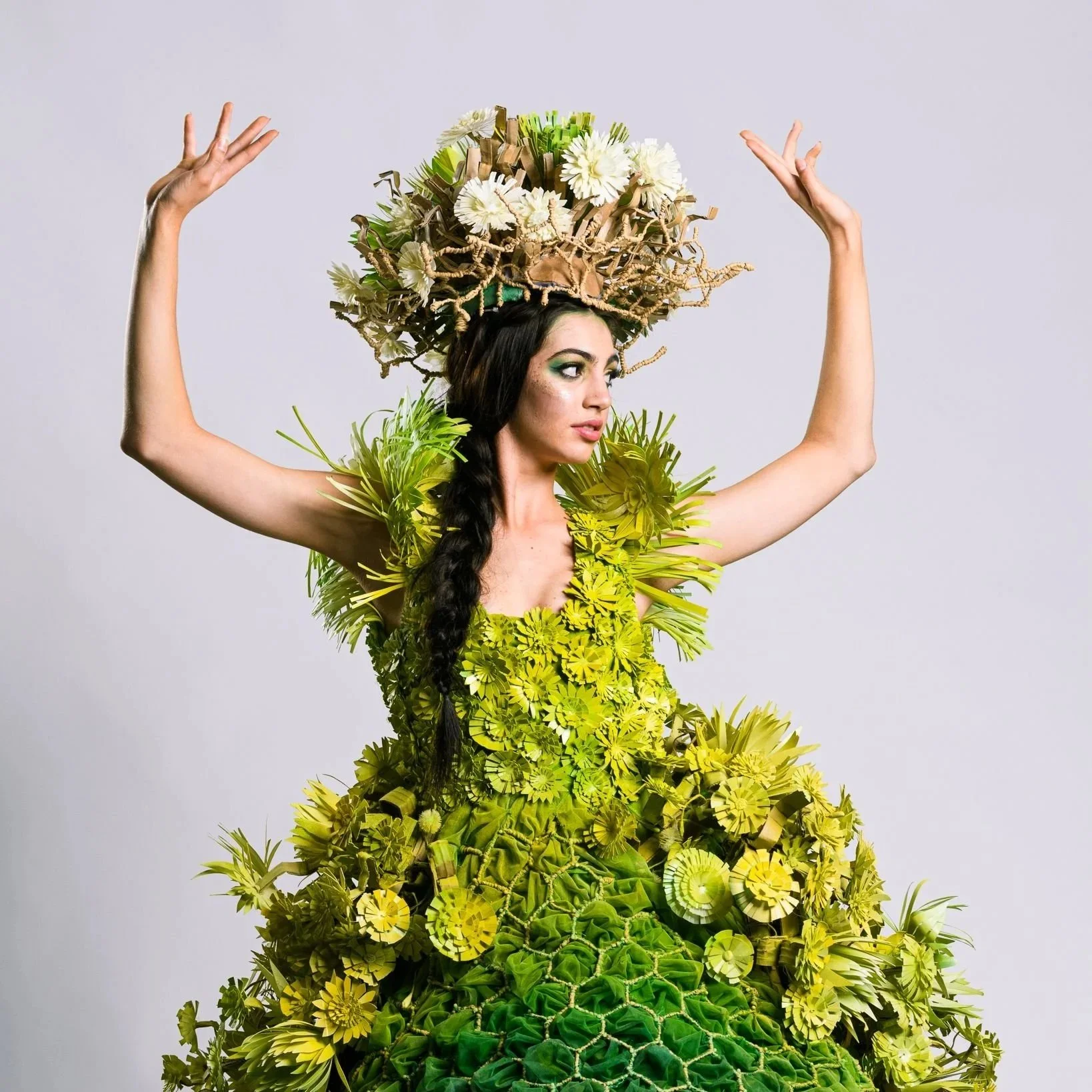 Sustainability meets glamour in Natalie Hamblin Designs. Using upcycled fabrics and household waste, Natalie crafts one-of-a-kind garments that tell a story of creativity, responsibility, and environmental respect.

Image & Information provided by Na