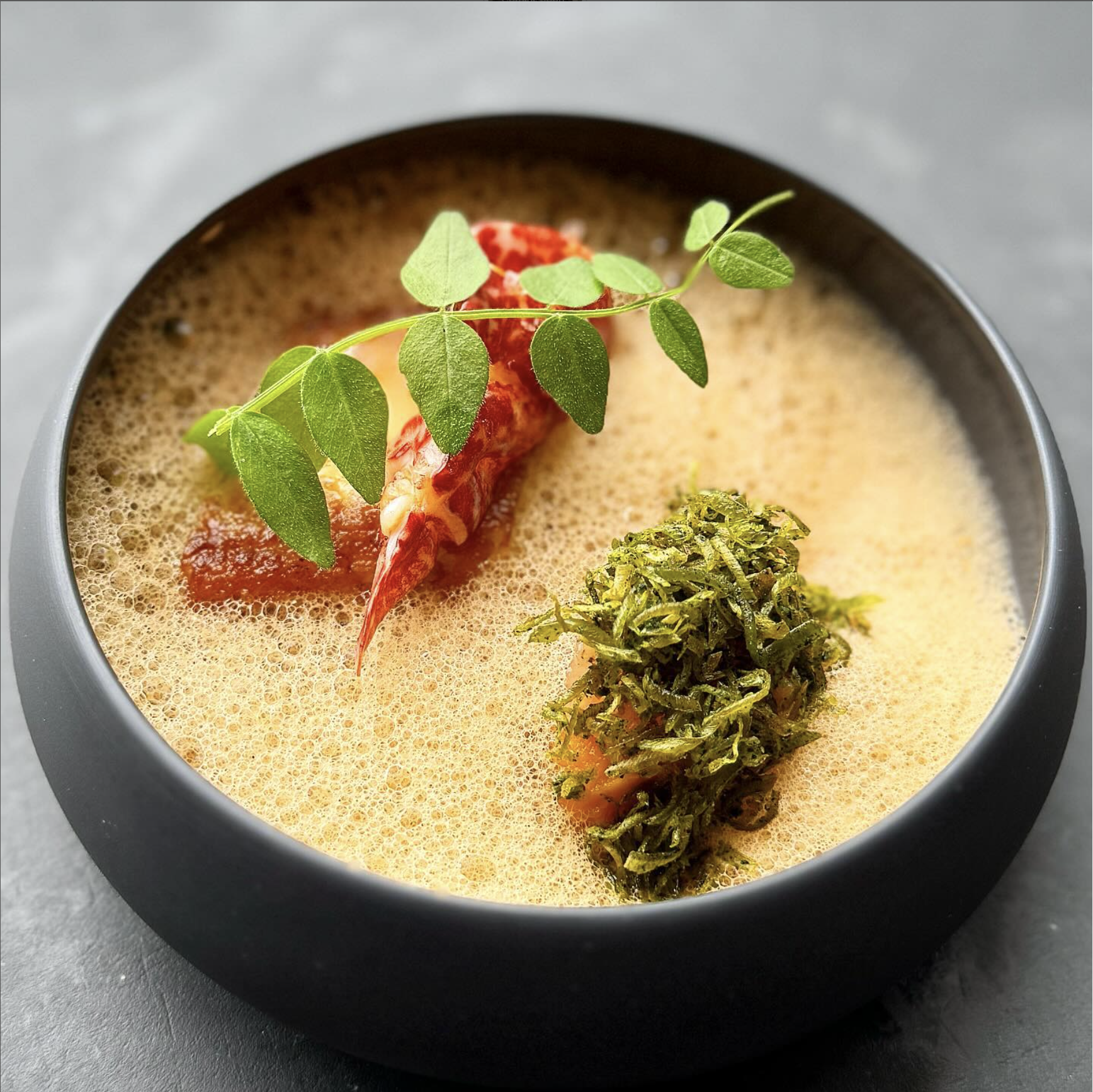 Sole with lobster, seafood bisque and sweet potato