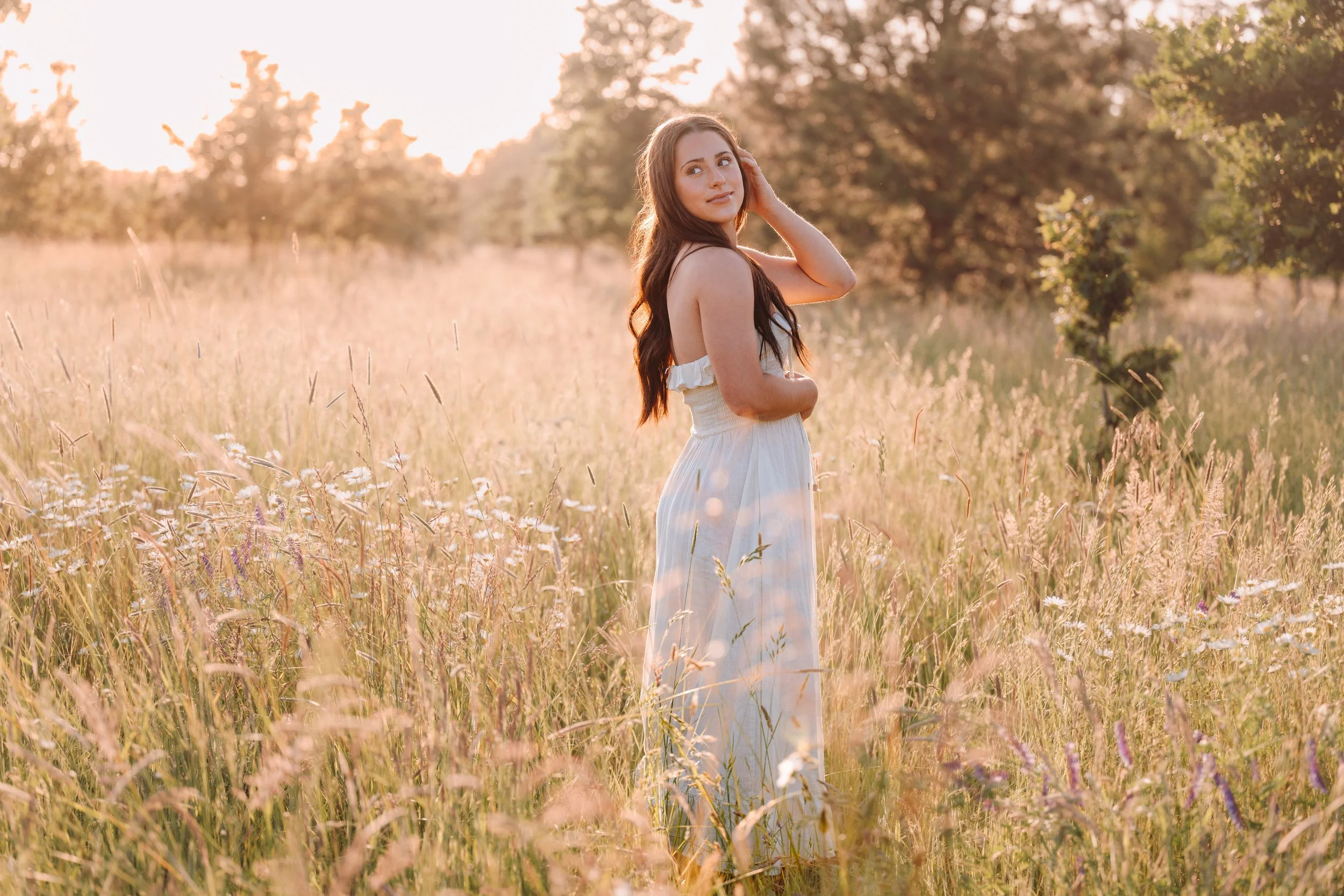 Senior girl in field at sunset at Graham Oaks Nature Park