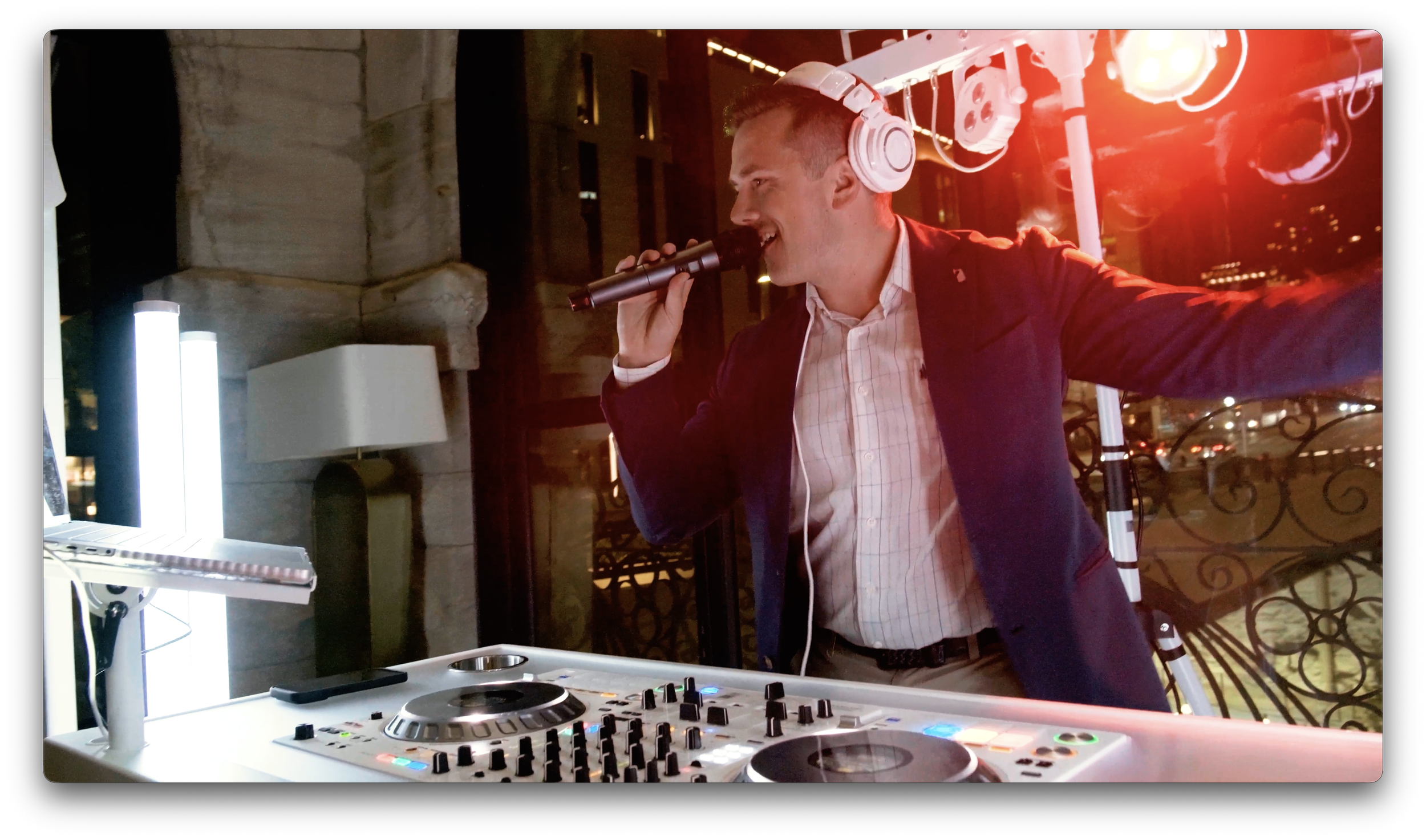 Wedding DJ Brice Clark at a wedding in downtown Nashville. Featuring all white DJ booth