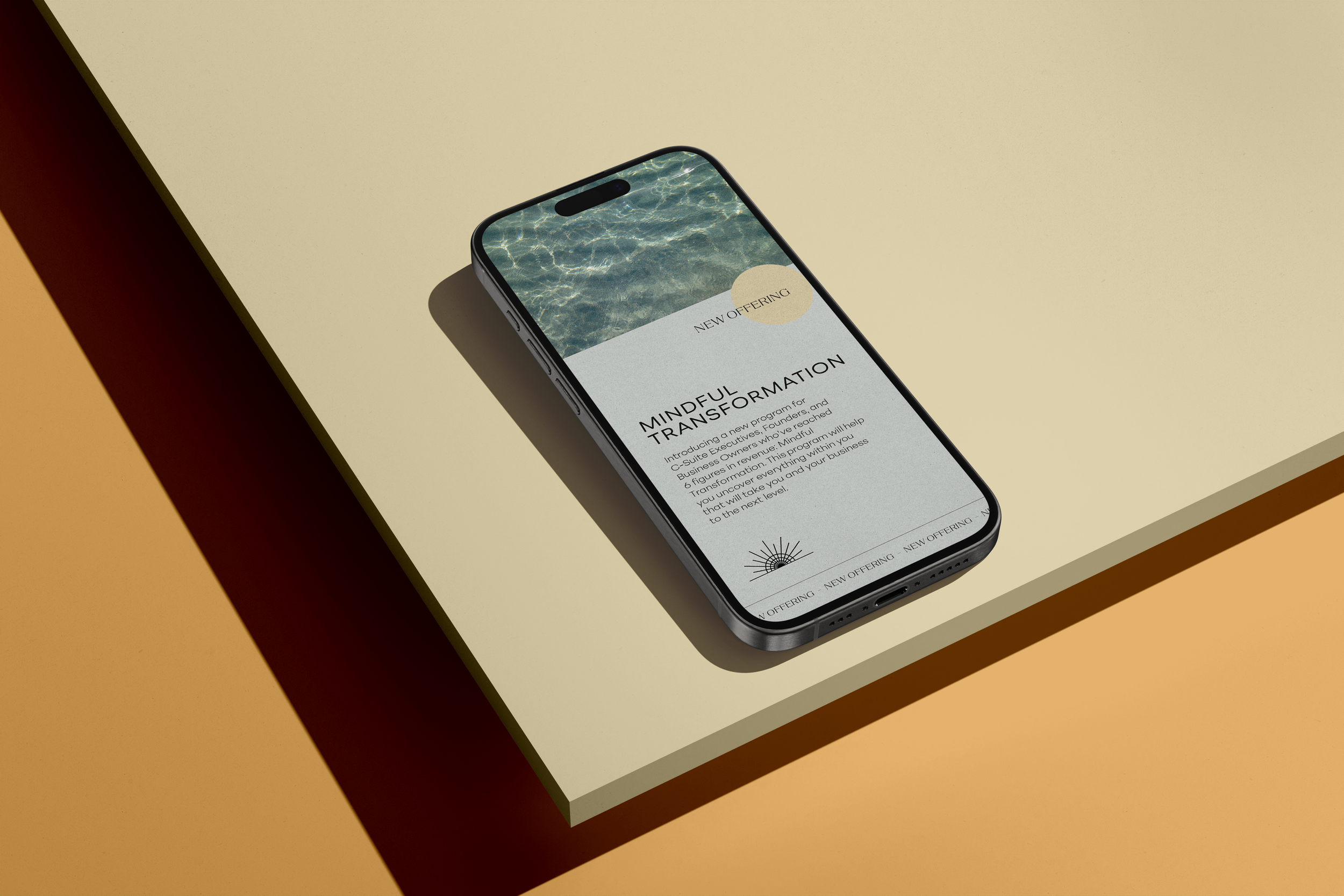Mockup of an iPhone on a yellow surface with Elizabeth Robinson Coaching & Consulting's branding and imagery