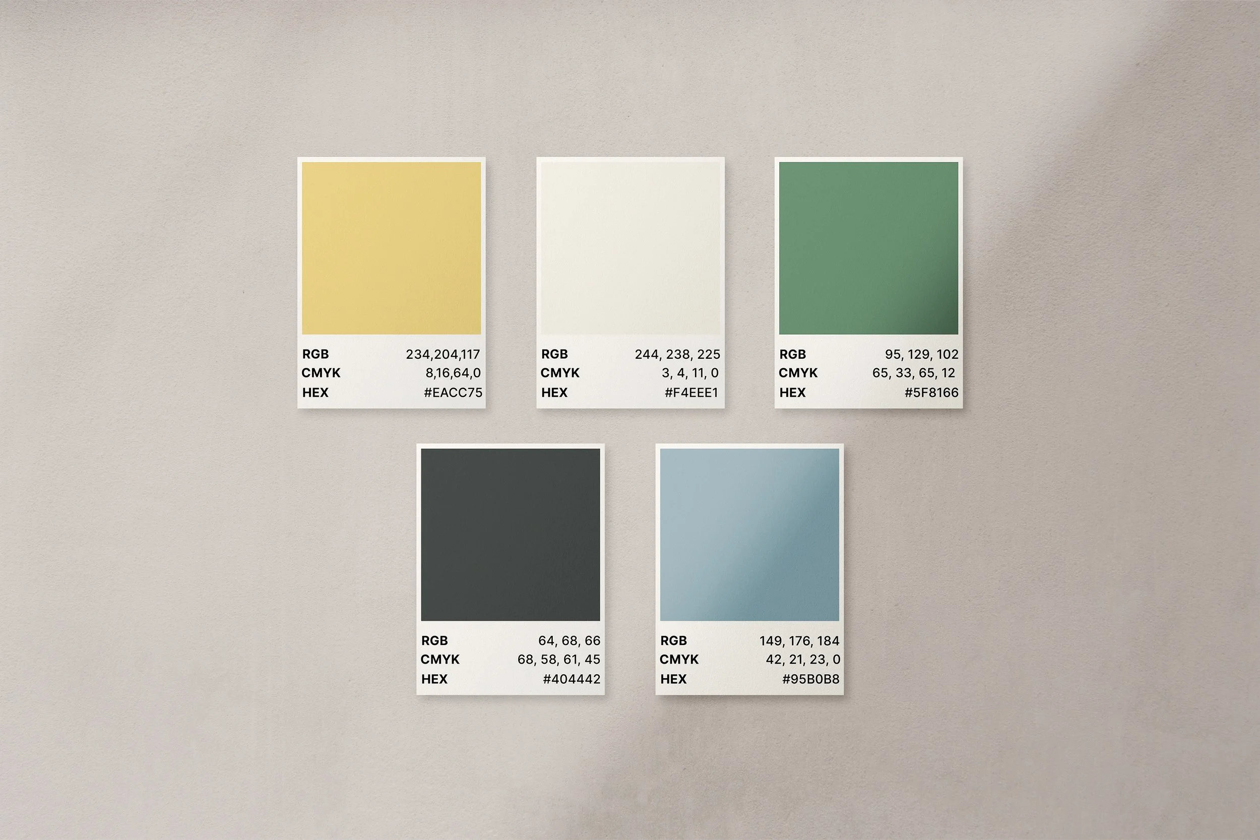 Mockup of color swatches with Open Doors Media's brand colors: yellow, white, green, dark gray and blue