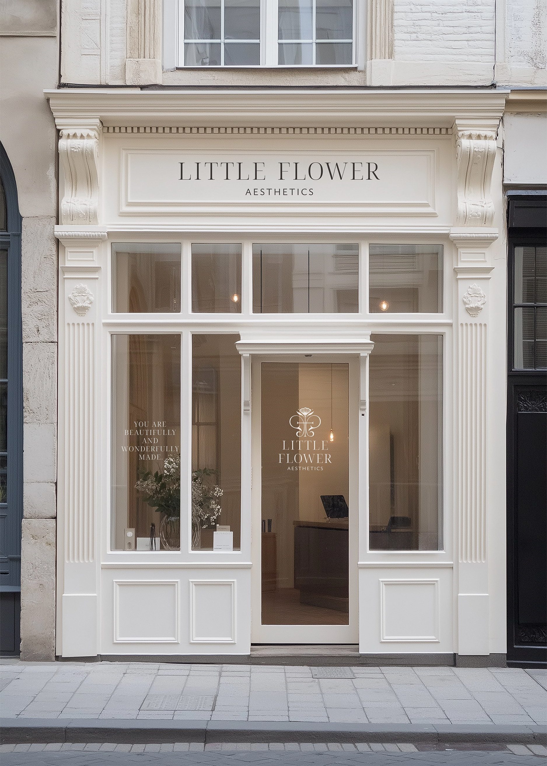 Mockup of Little Flower Aesthetics wordmark, logo and tagline on a storefront sign and windows