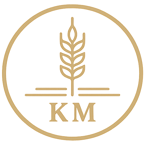 A gold-colored circular logo featuring a stylized wheat stalk, with the letters "KM" below it, on a black background.