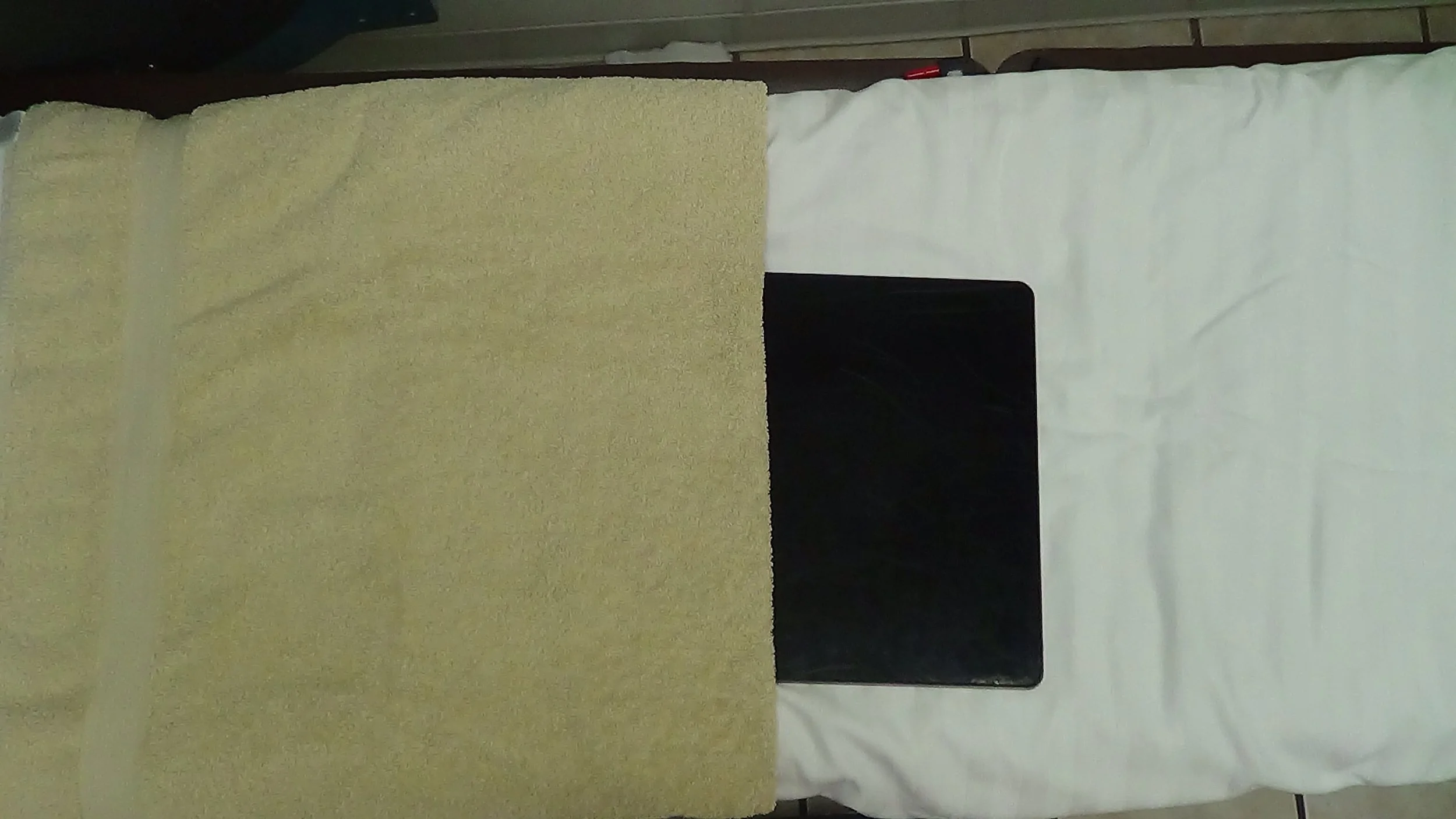 Q63-Mat 1_2 covered by towel.jpg