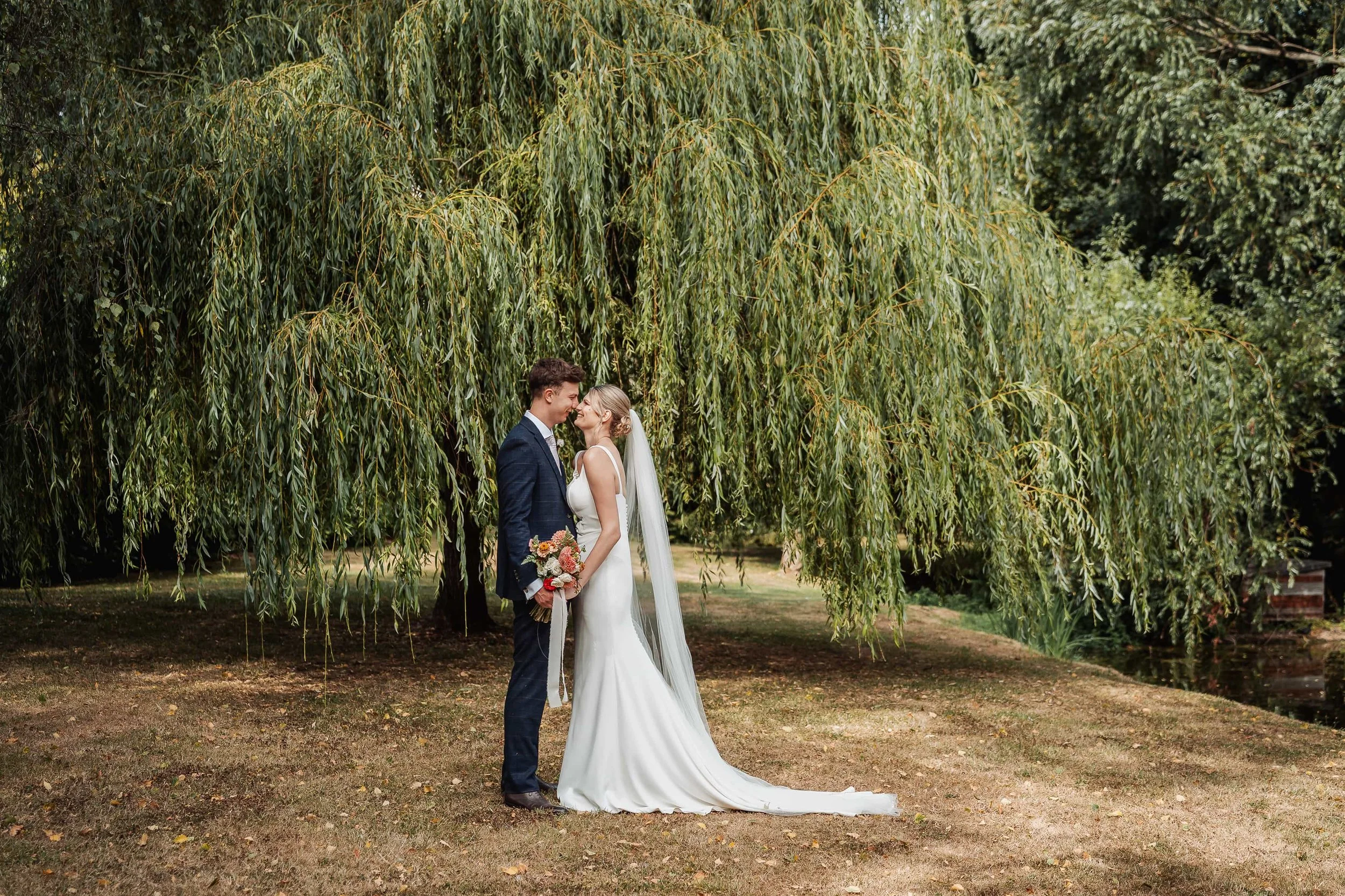 743_bride-groom-willow-tree-nose-to-nose-wedding-portrait.jpg
