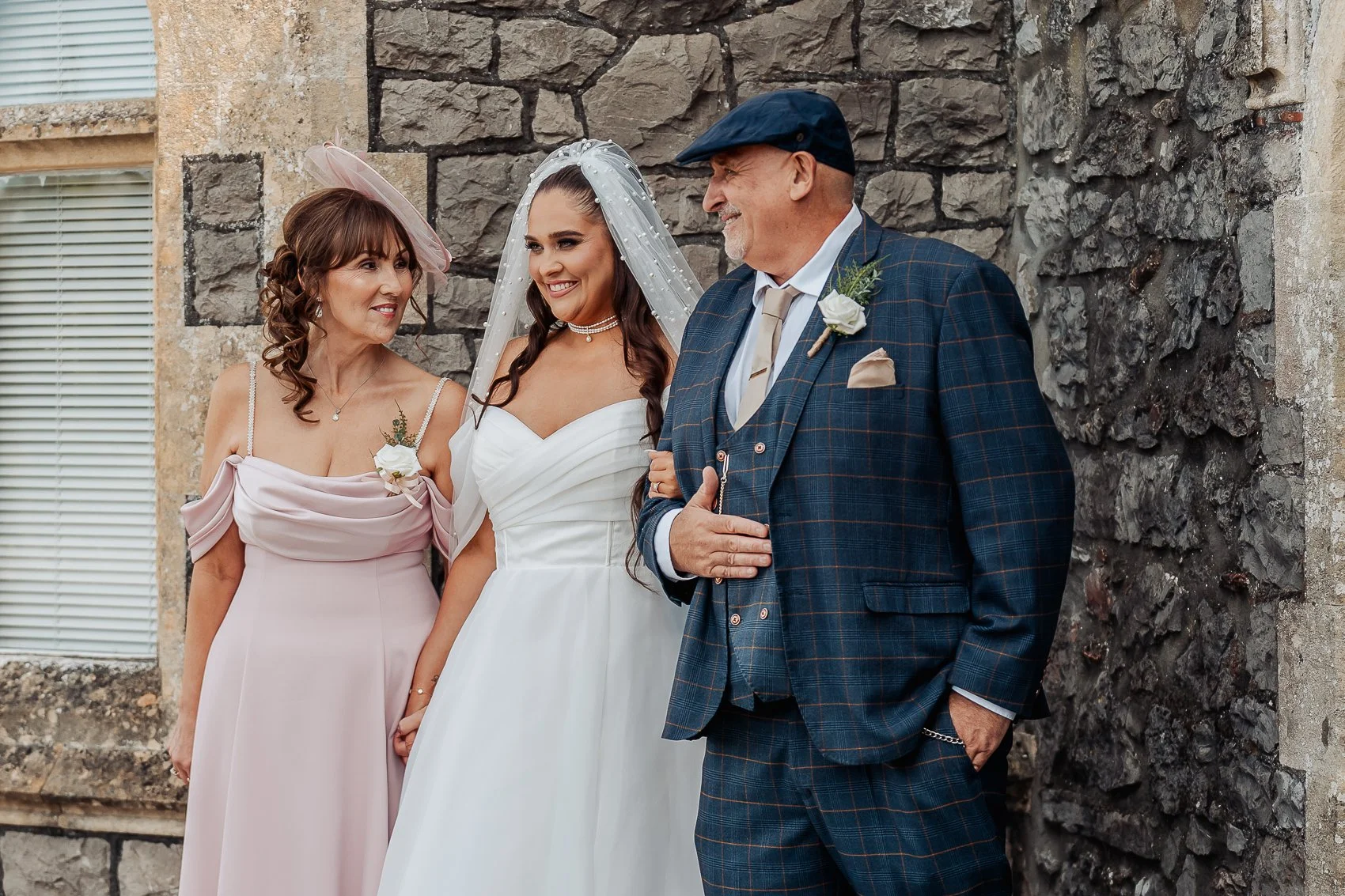 007-cadbury-house-wedding-bride-with-parents.jpg