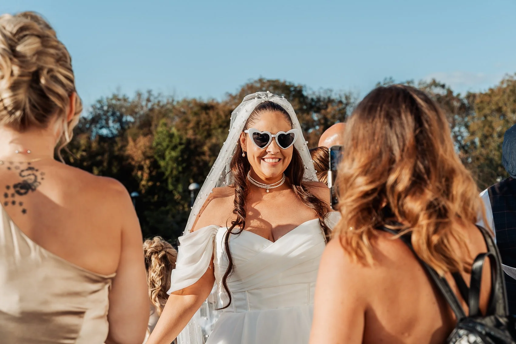 022-cadbury-house-wedding-bride-heart-sunglasses.jpg