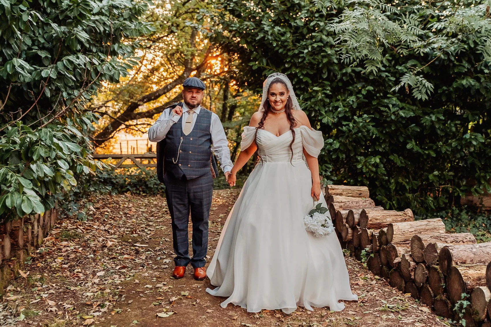 032-cadbury-house-wedding-couple-woodland-path-portrait.jpg