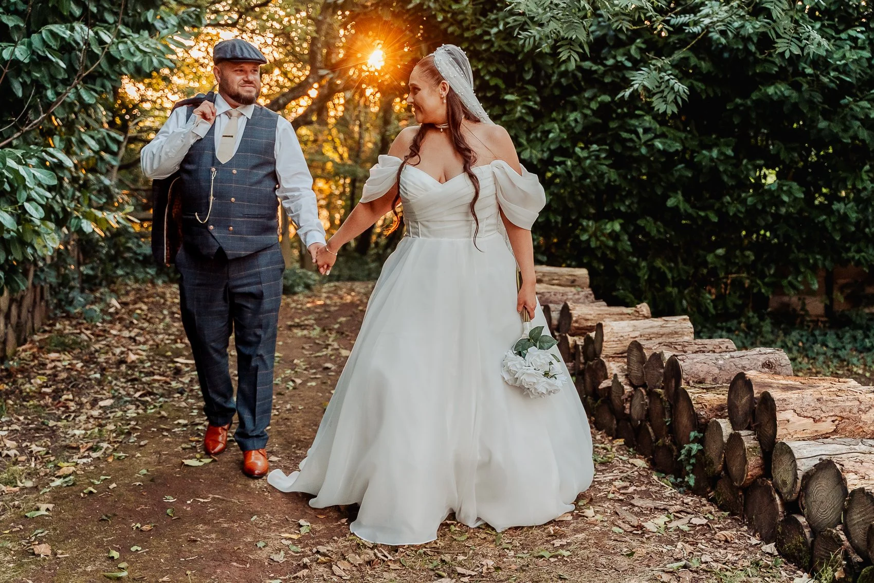 034-cadbury-house-wedding-couple-walking-golden-hour.jpg
