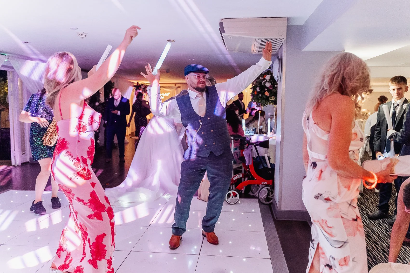 037-cadbury-house-wedding-groom-dancing-evening.jpg