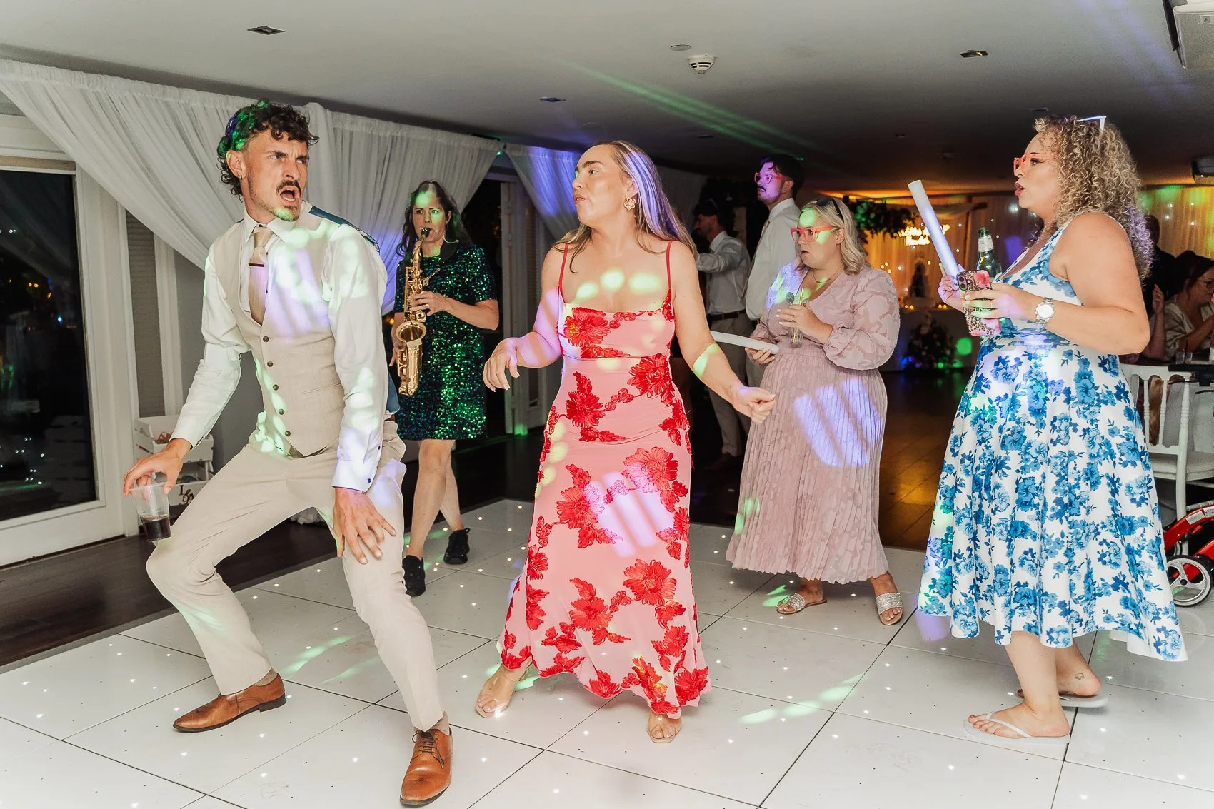 038-cadbury-house-wedding-dancefloor-saxophonist.jpg