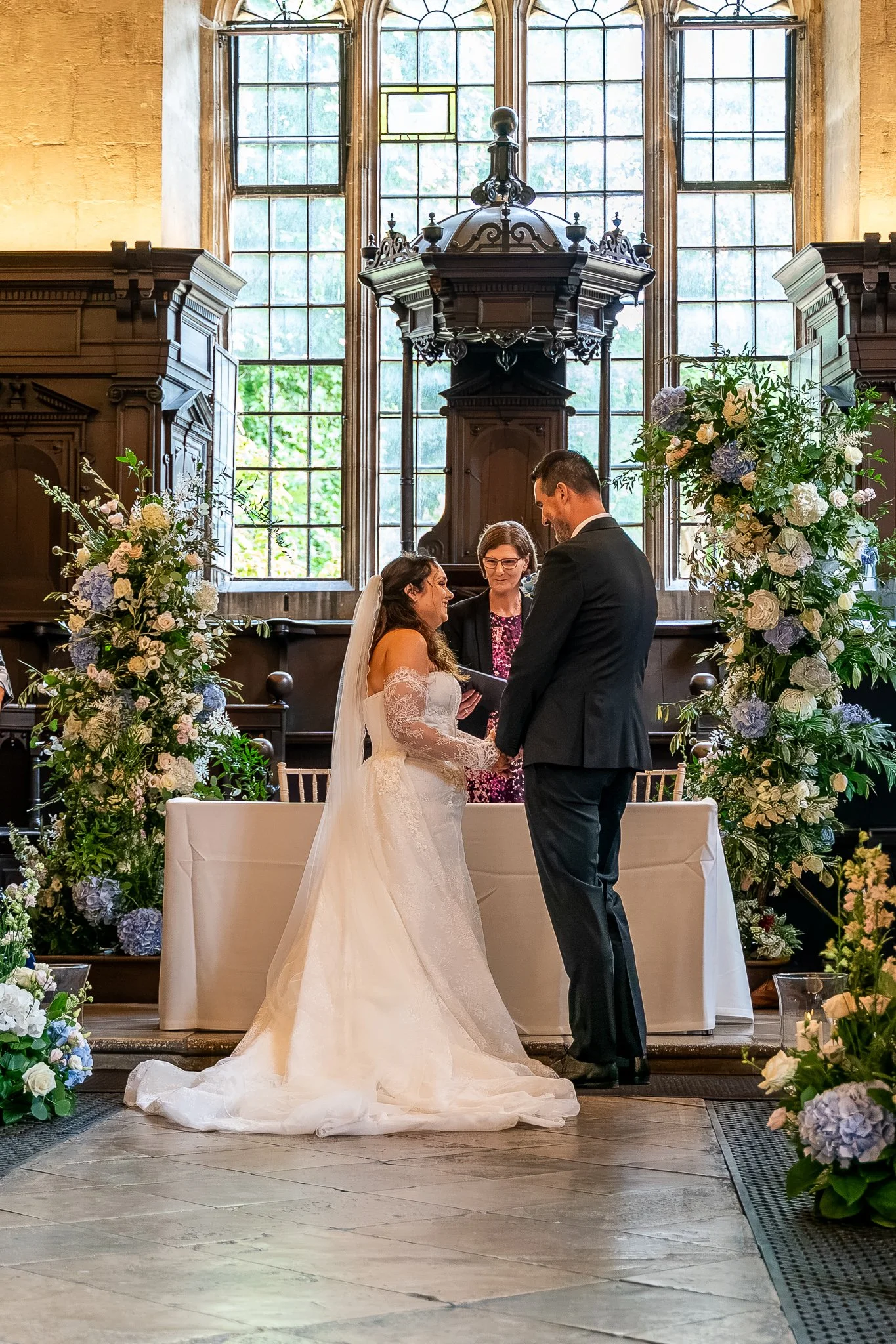 237-joe-stacey-bride-groom-floral-columns-bodleian-wedding.jpg